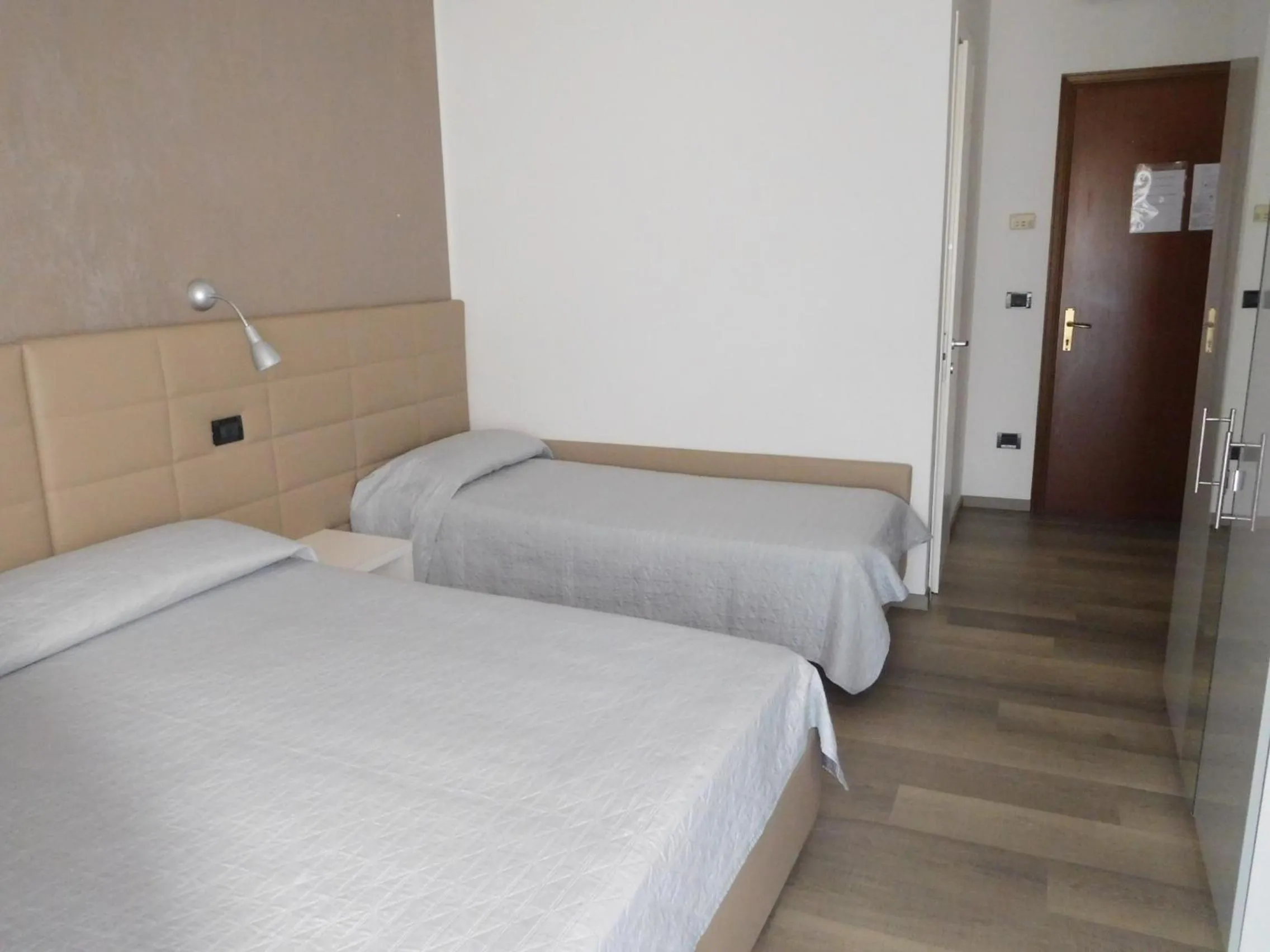 Bed in Hotel Emperador