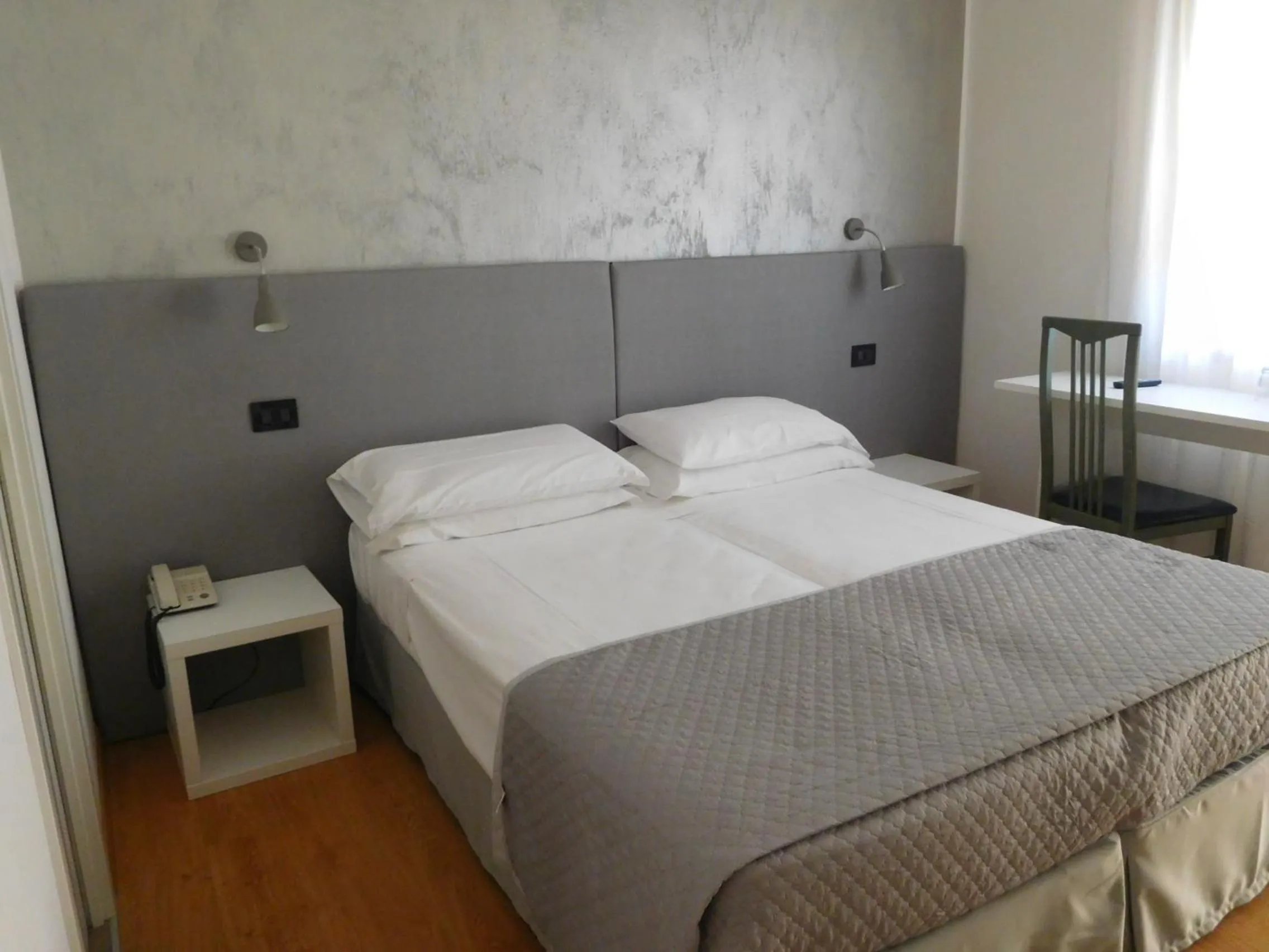 Bed in Hotel Emperador