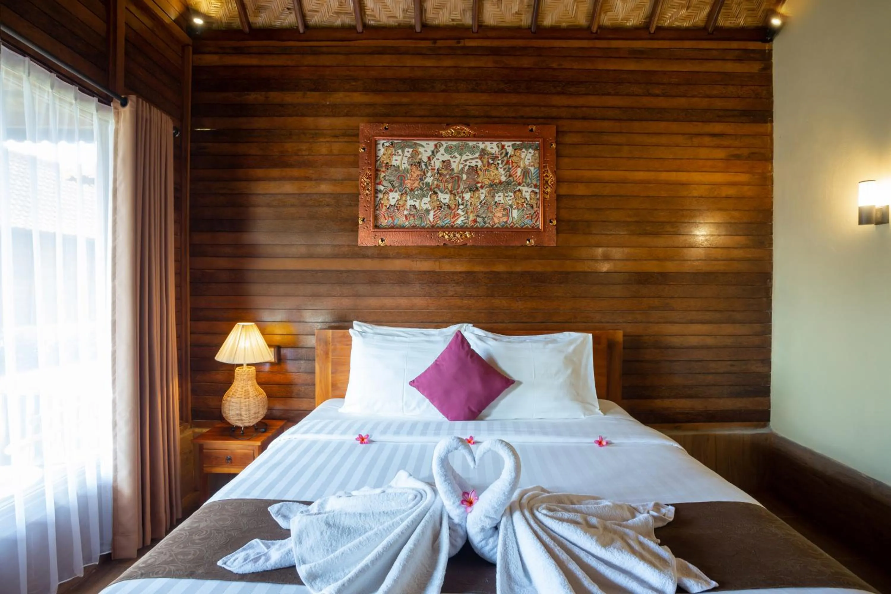 Bed in Rijet Villa Beach & Restaurant
