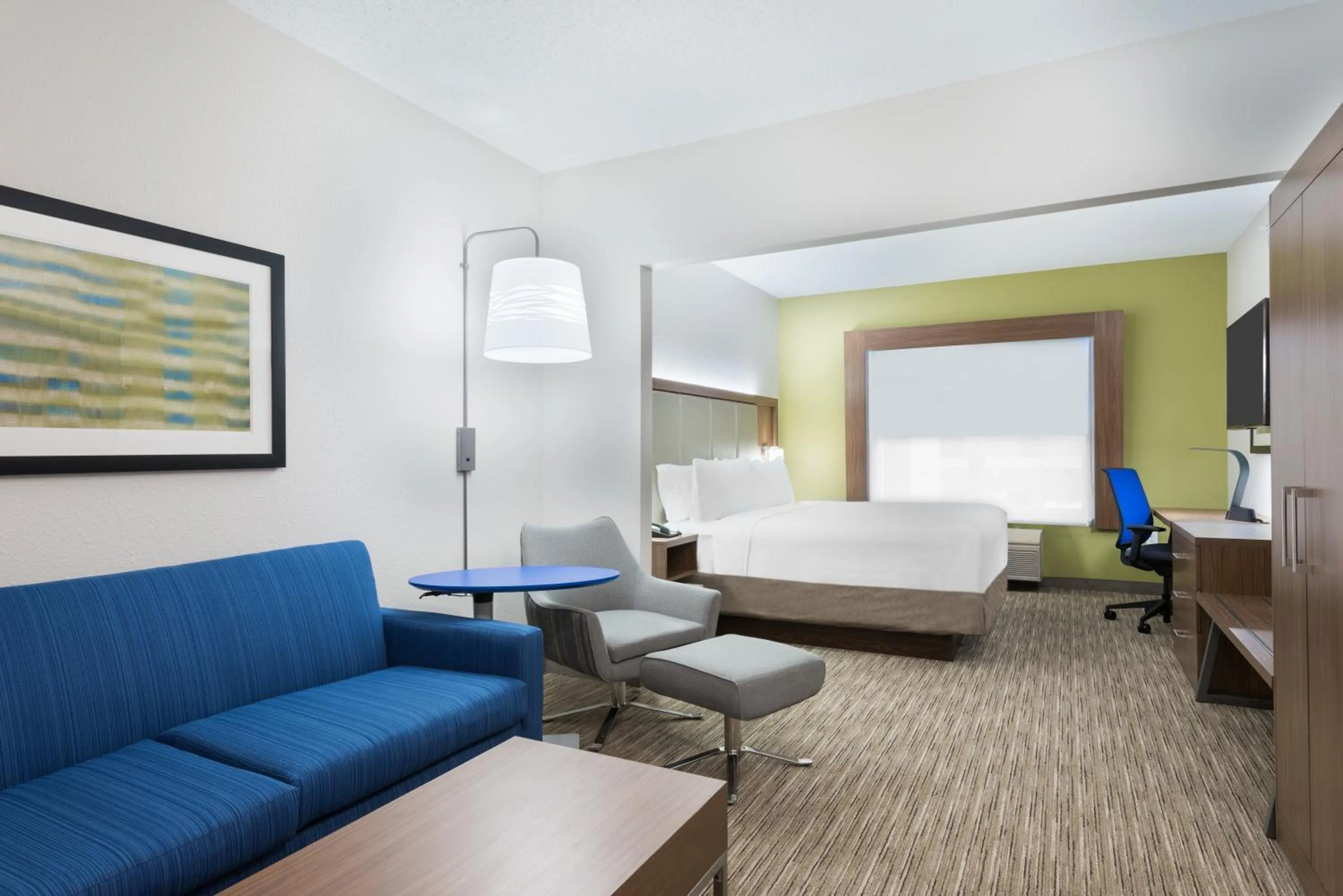 Seating area, Bed in Holiday Inn Express & Suites - Columbus Airport East by IHG