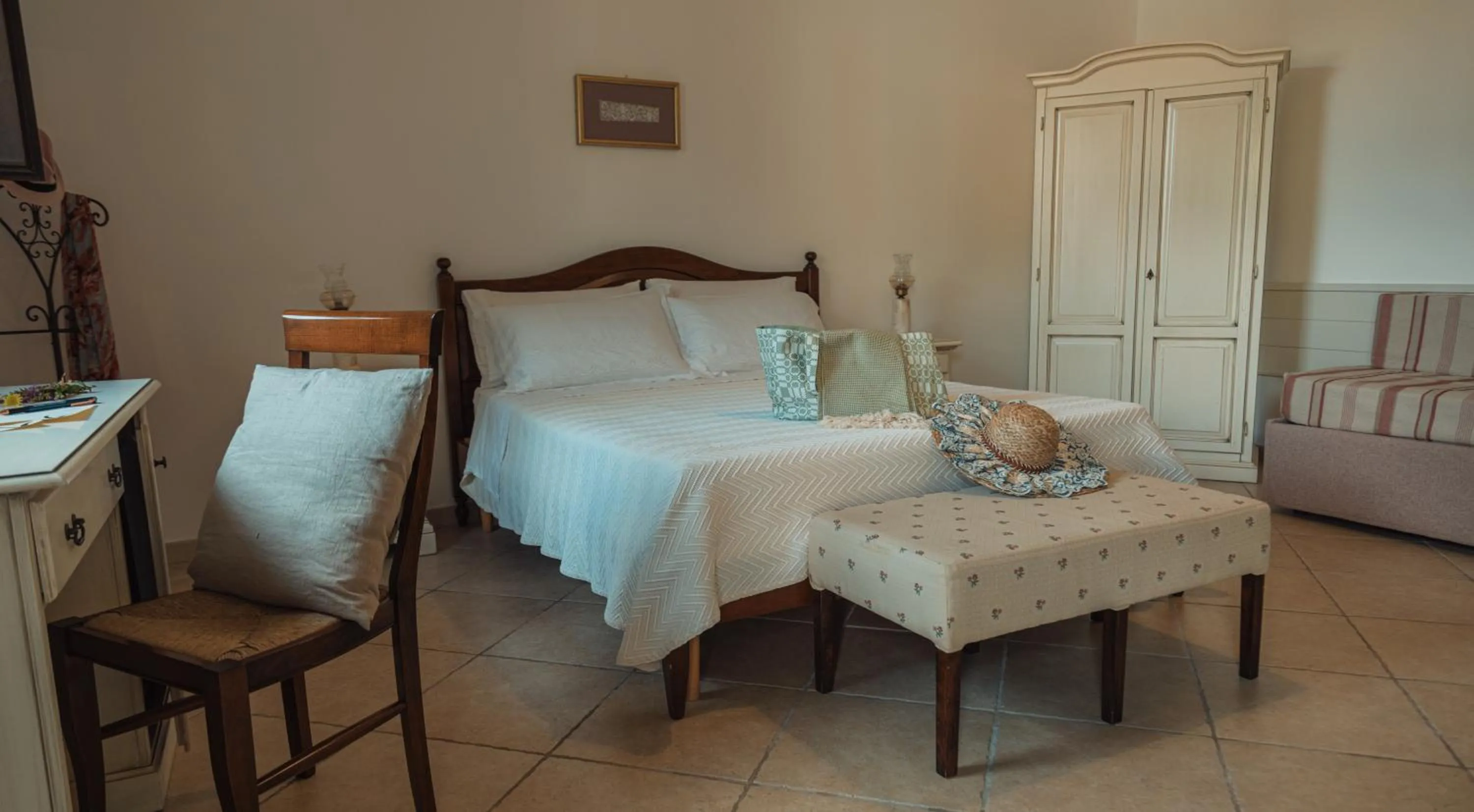 Photo of the whole room, Bed in Tenuta Masseria & Spa Chicco Rizzo