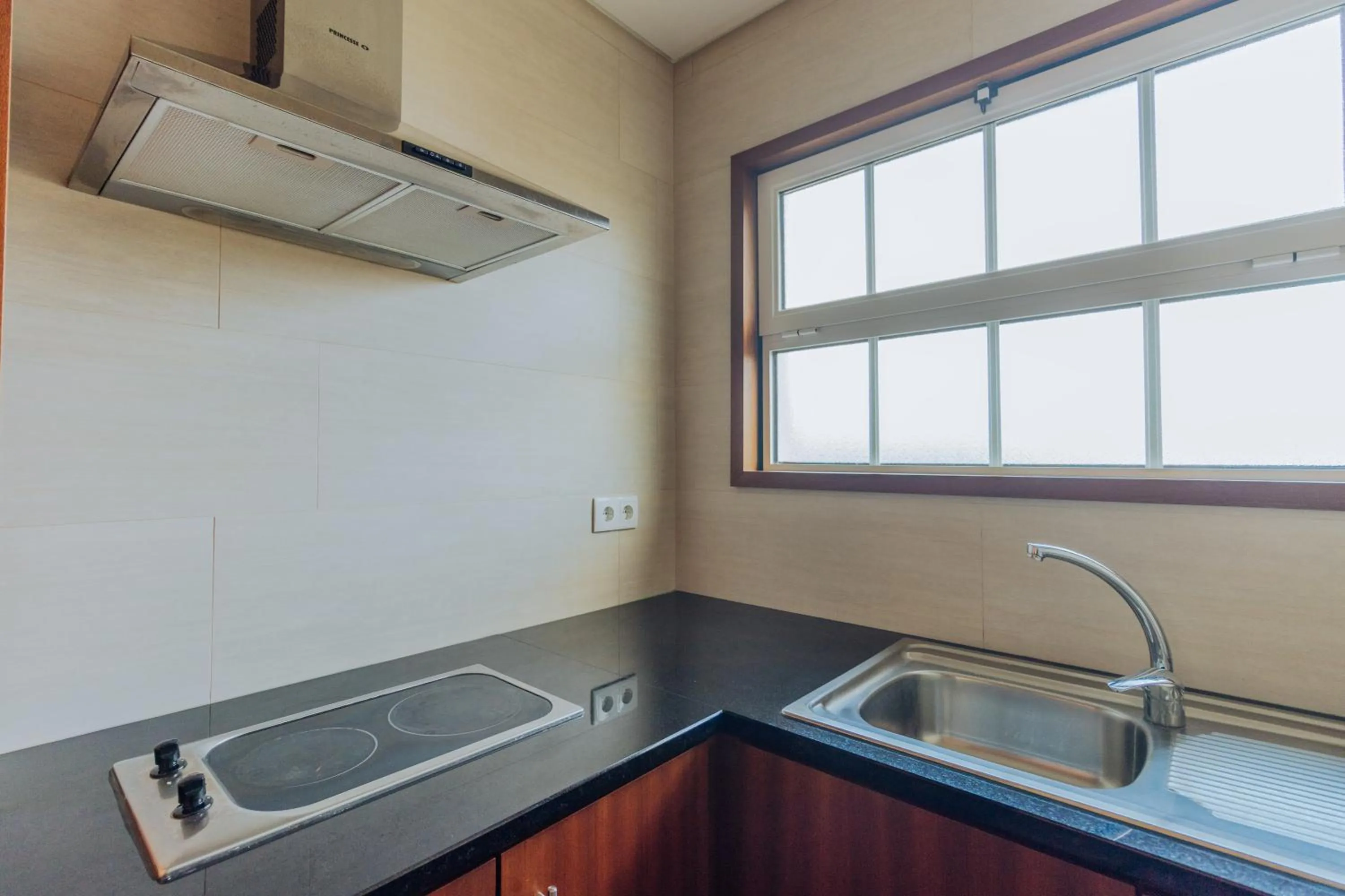 Kitchen or kitchenette in Solar Do Conde Garden Hotel