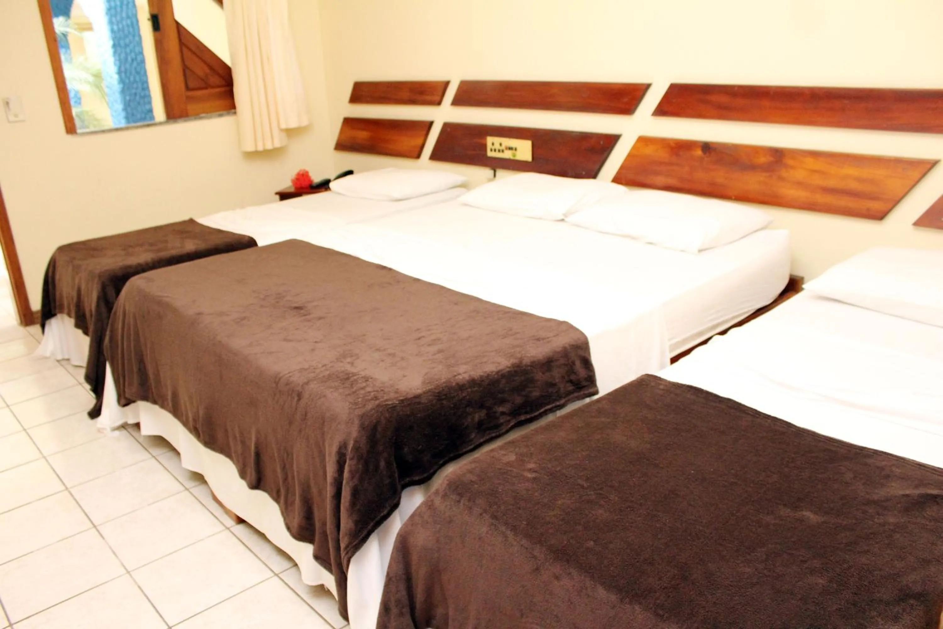 Bed in Coroa Bella Praia Hotel