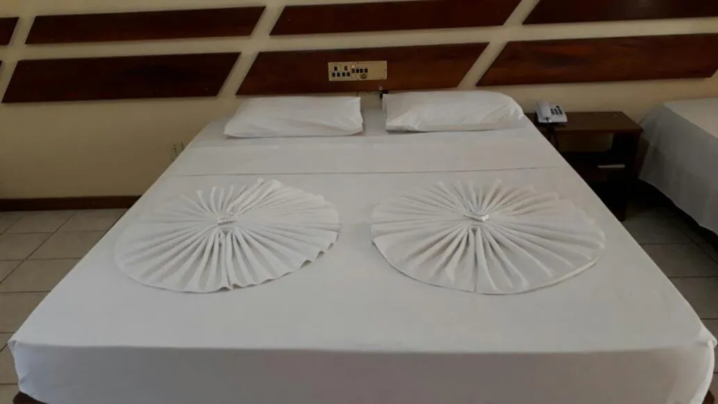 Bed in Coroa Bella Praia Hotel