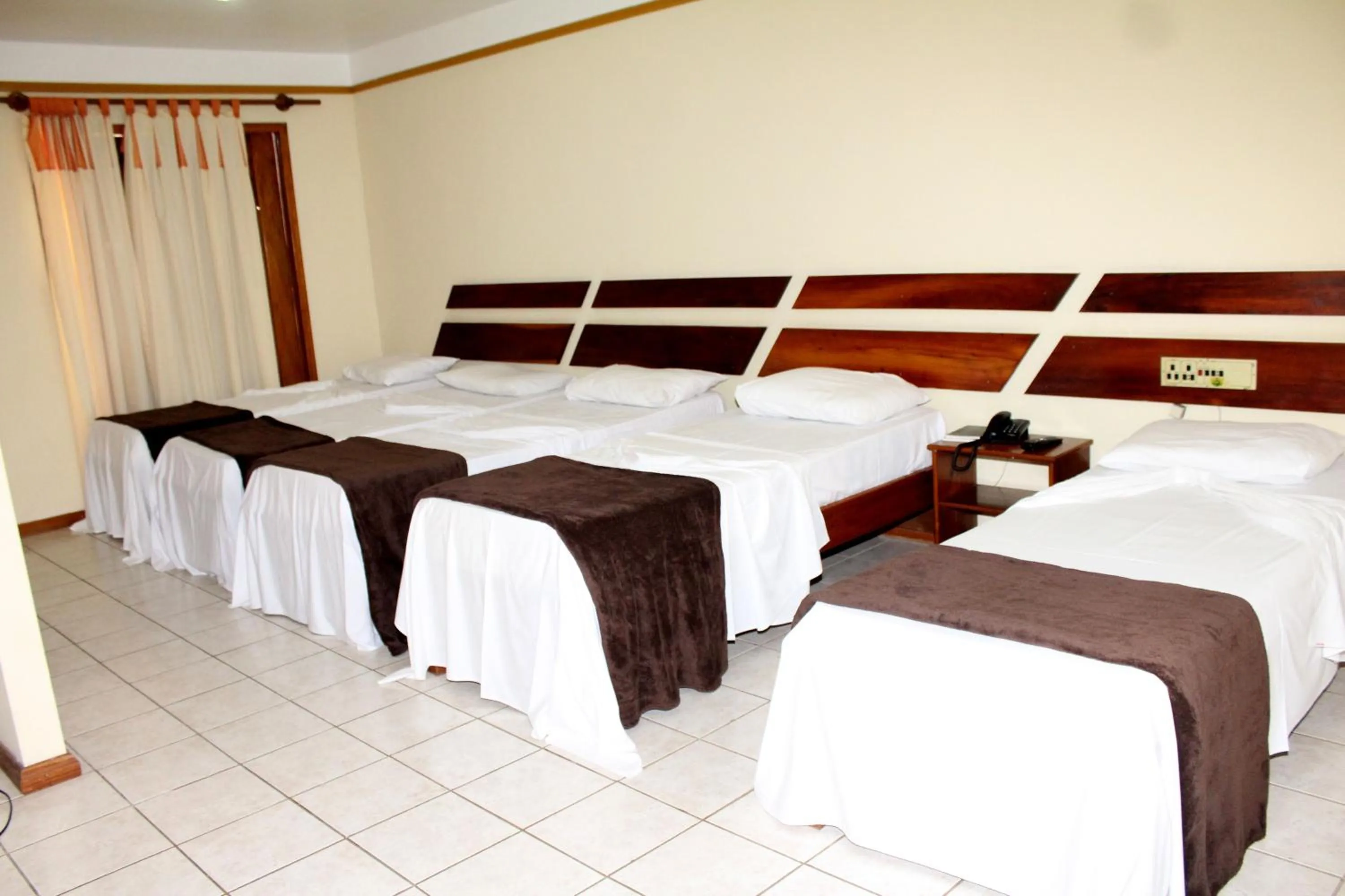 Bed in Coroa Bella Praia Hotel