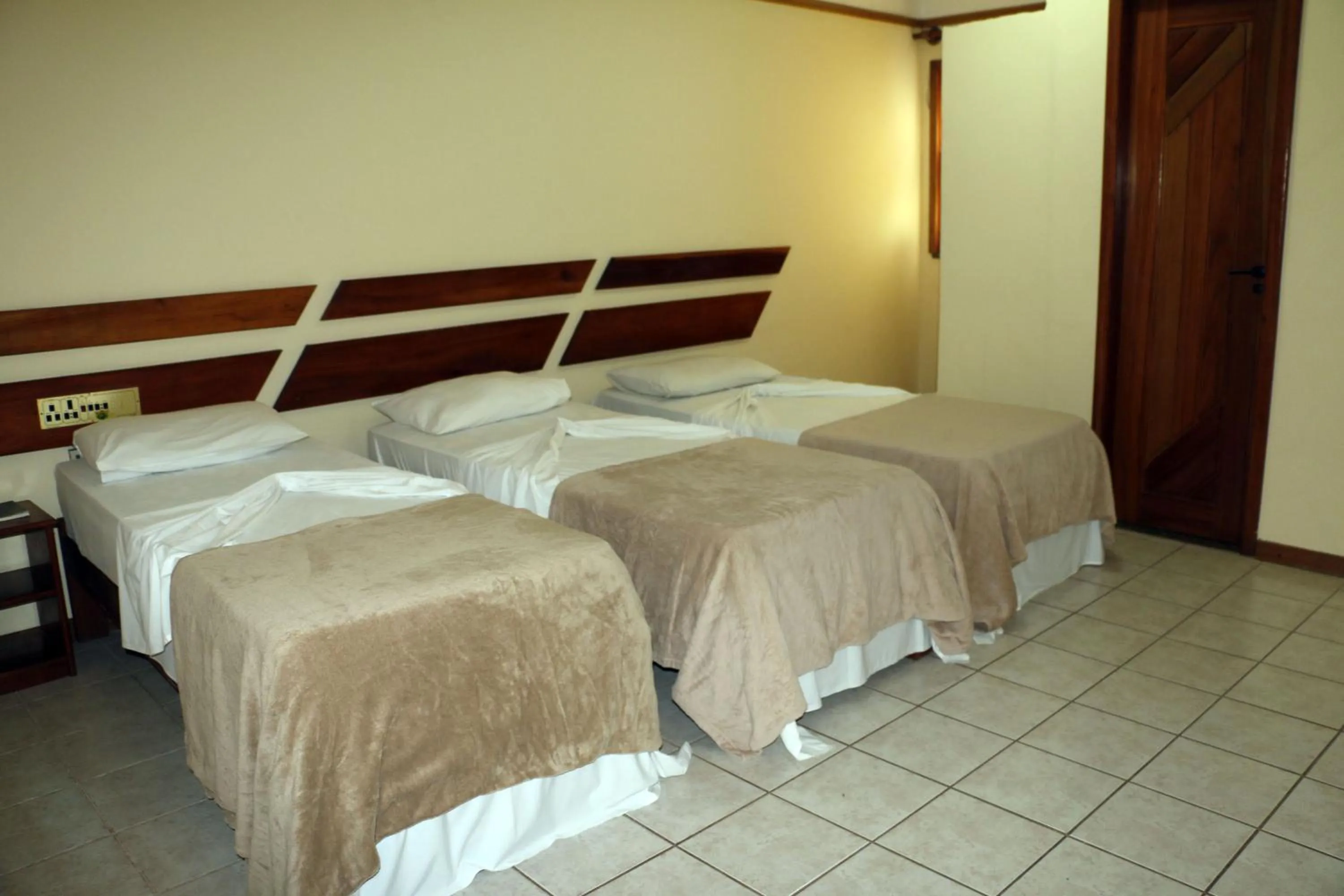 Bed in Coroa Bella Praia Hotel