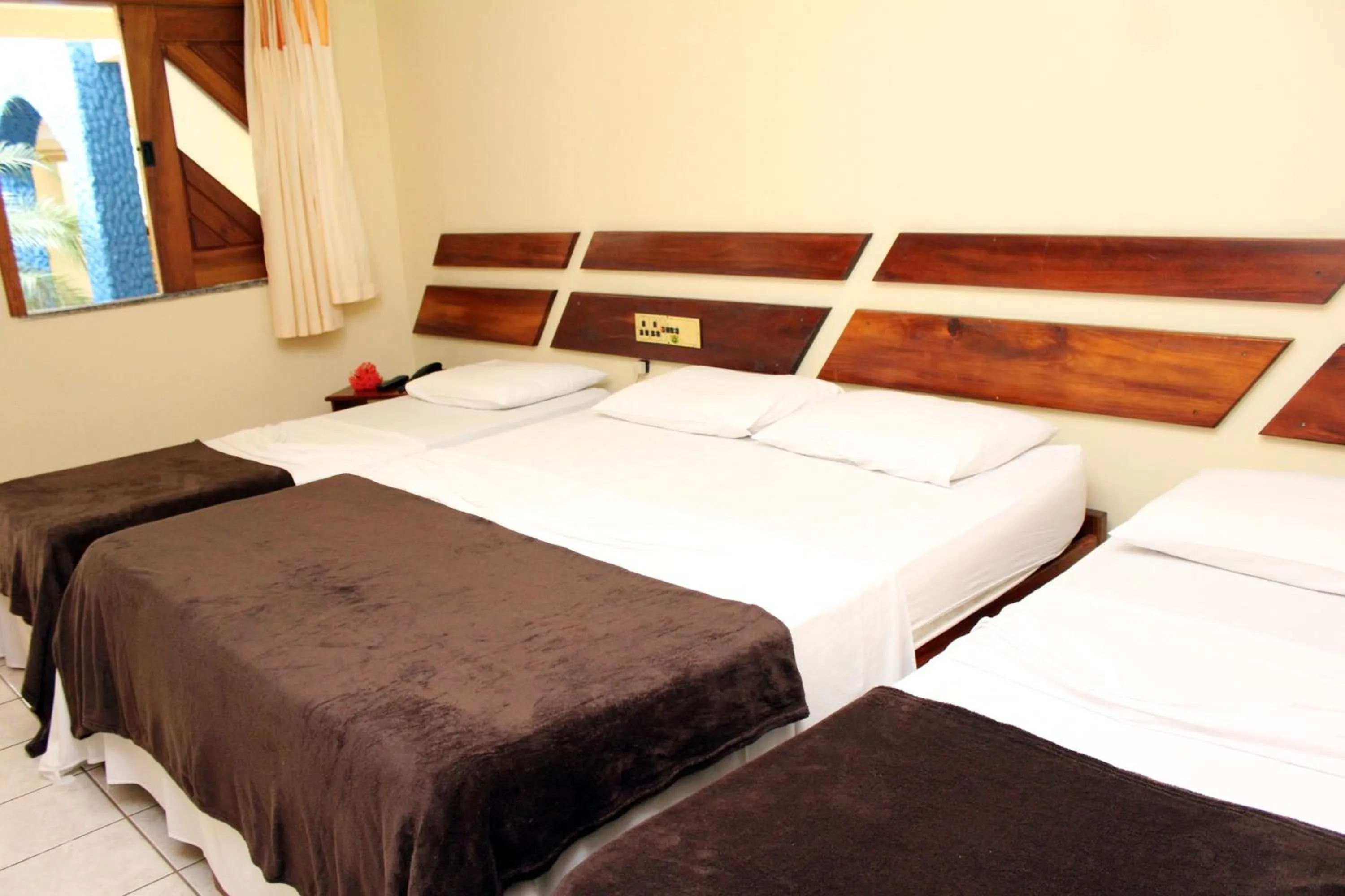 Bed in Coroa Bella Praia Hotel