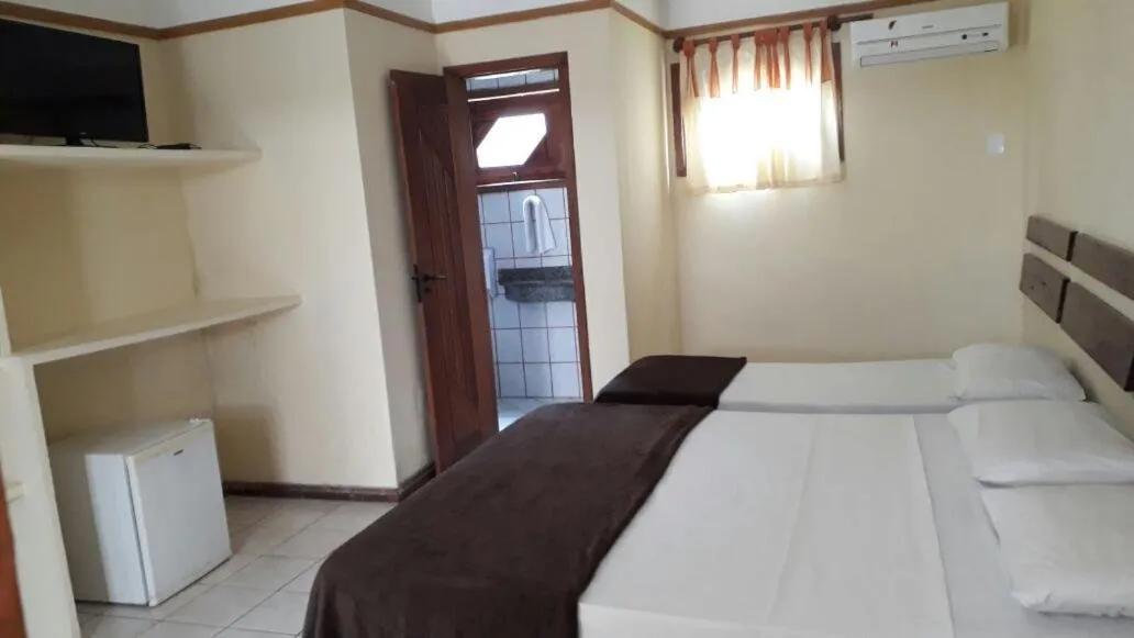 Bed in Coroa Bella Praia Hotel