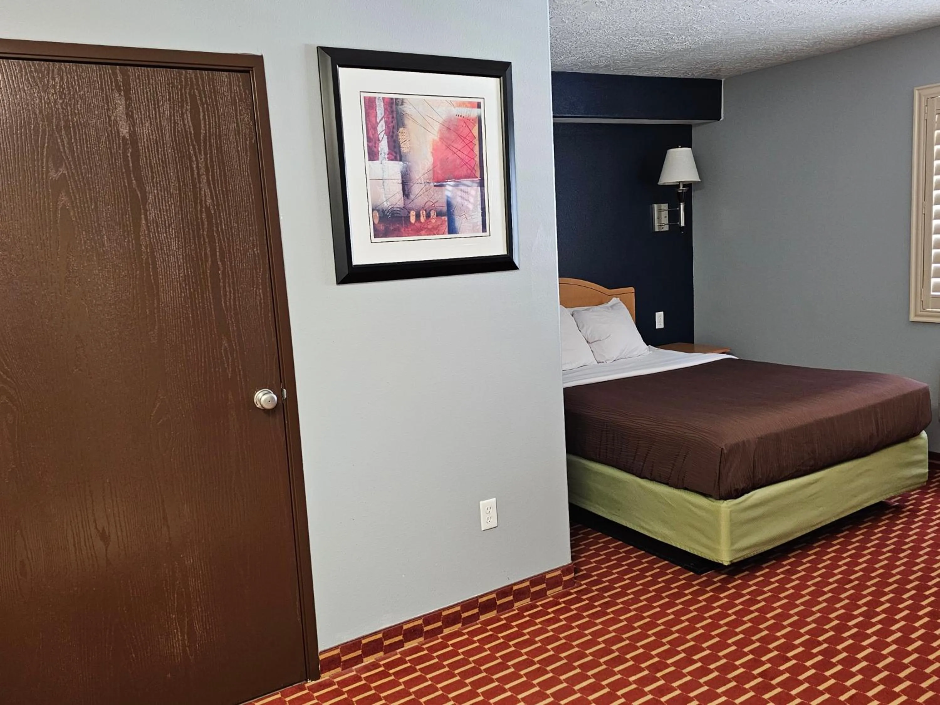 Bed in Executive Inn & Suites Extended Stay - Vernal