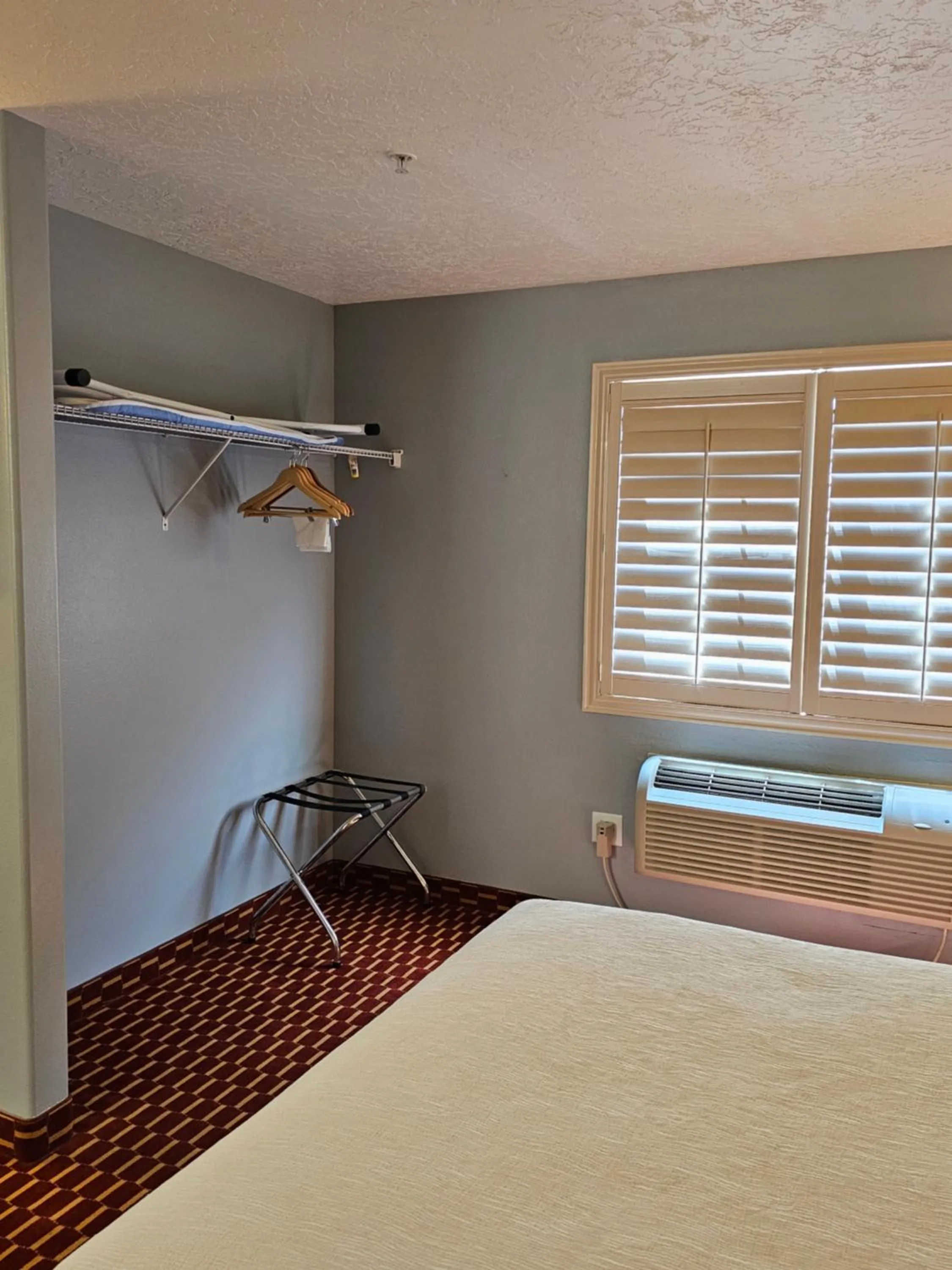 wardrobe, Bed in Executive Inn & Suites Extended Stay - Vernal
