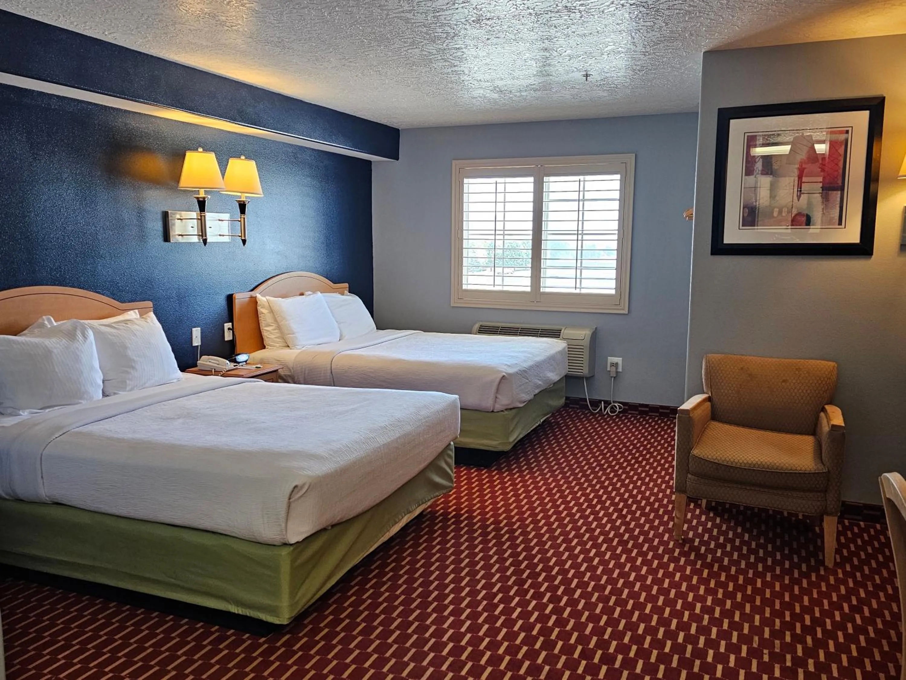 Bed in Executive Inn & Suites Extended Stay - Vernal