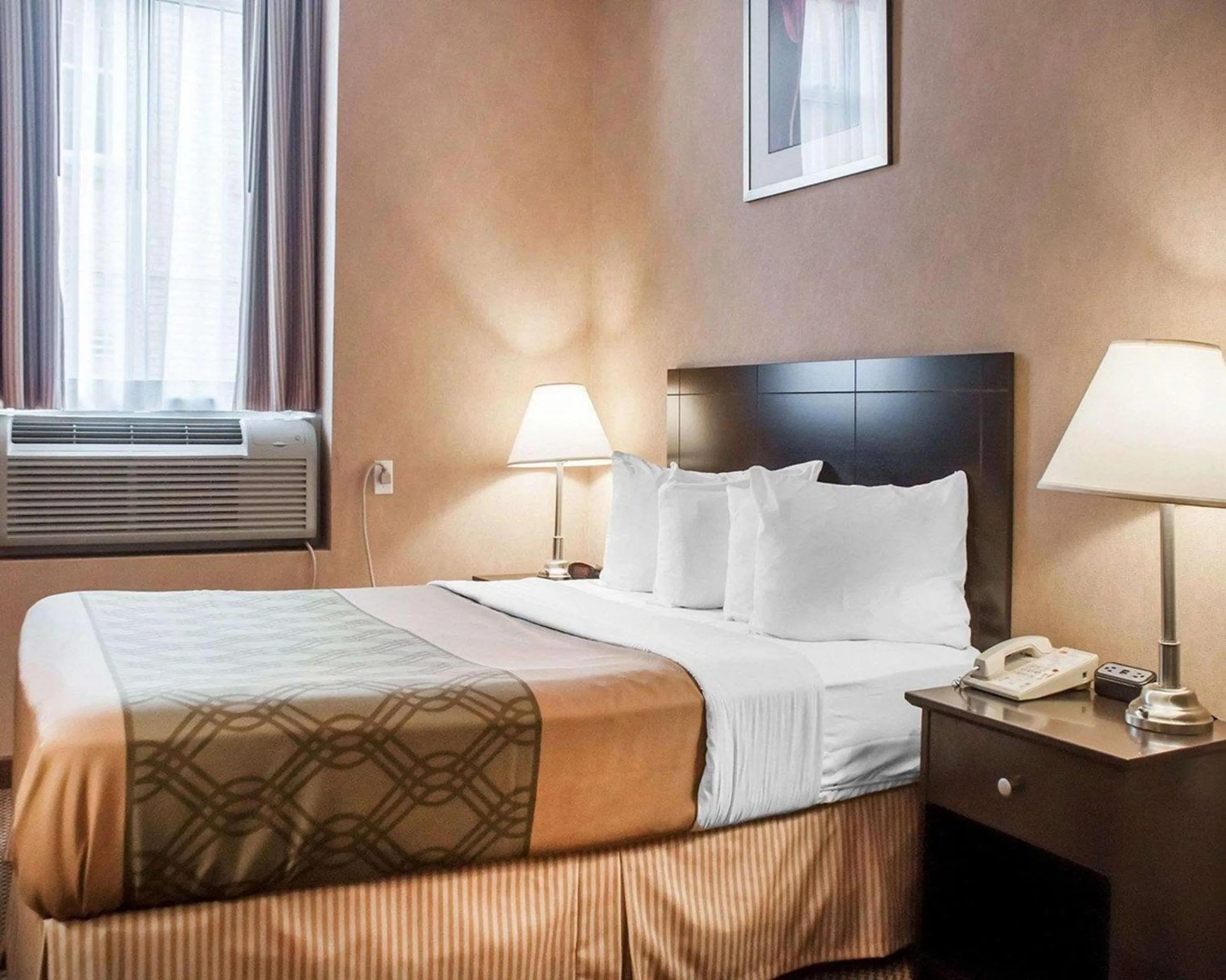 Bedroom in Woodstock Inn and Suites