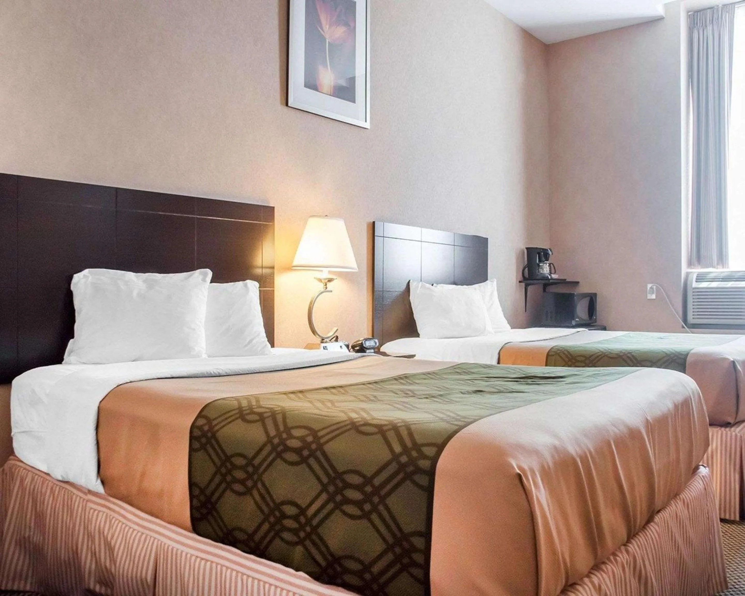 Bedroom in Woodstock Inn and Suites