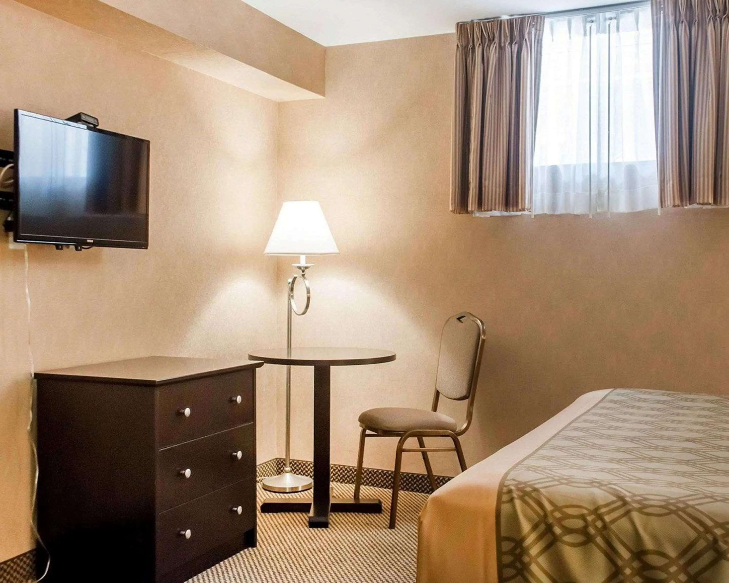 Bedroom in Woodstock Inn and Suites