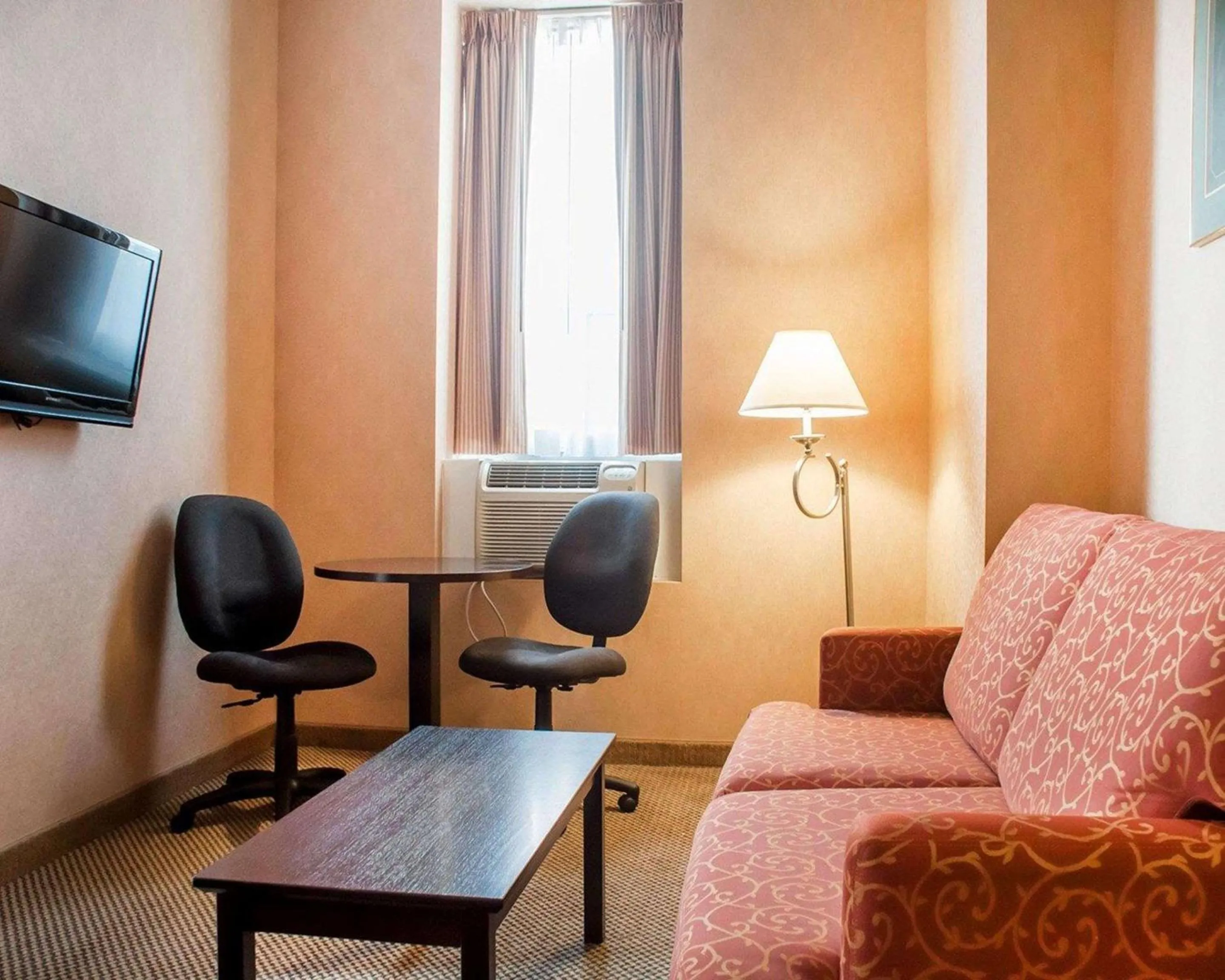 Bedroom in Woodstock Inn and Suites