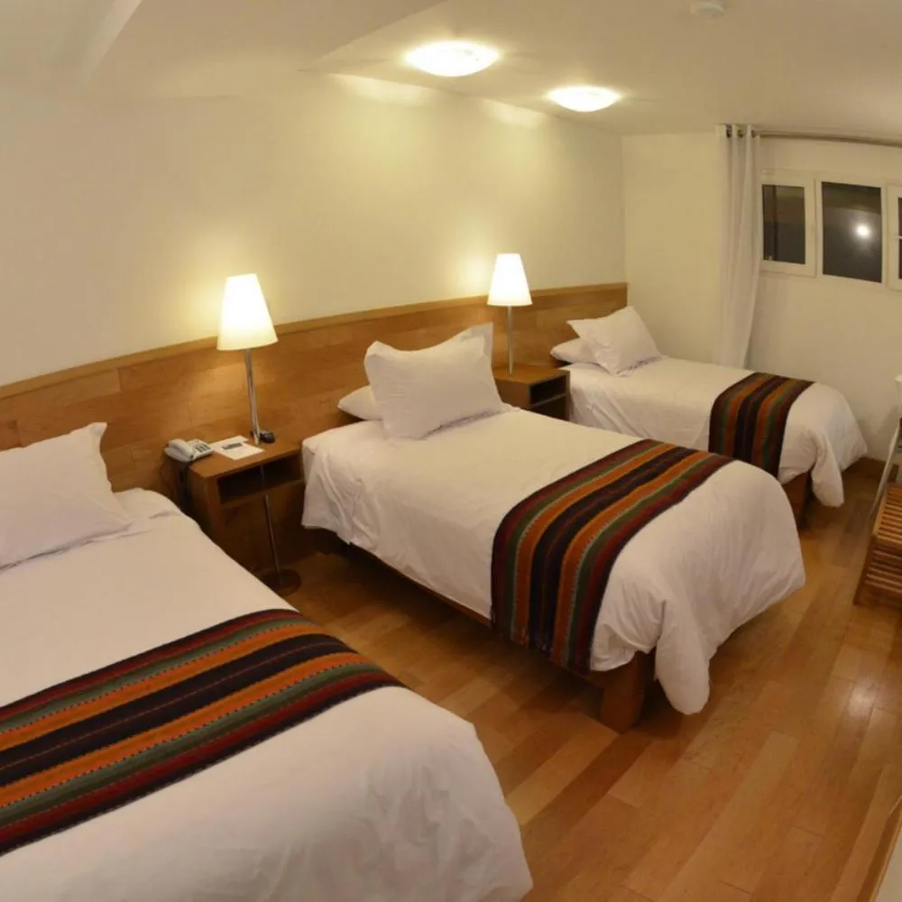 Bed in Hotel Plaza de Armas Cusco