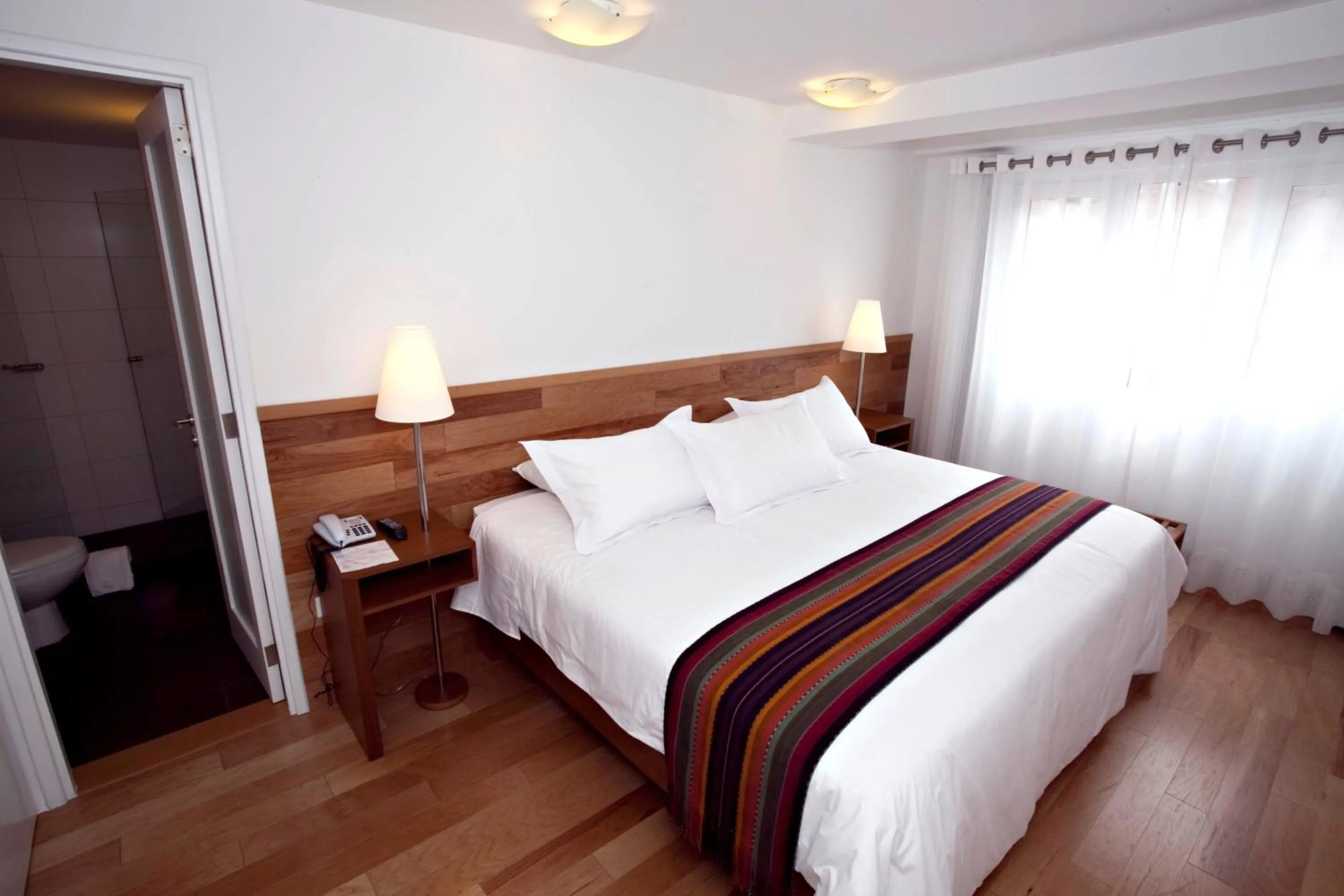 Bed in Hotel Plaza de Armas Cusco