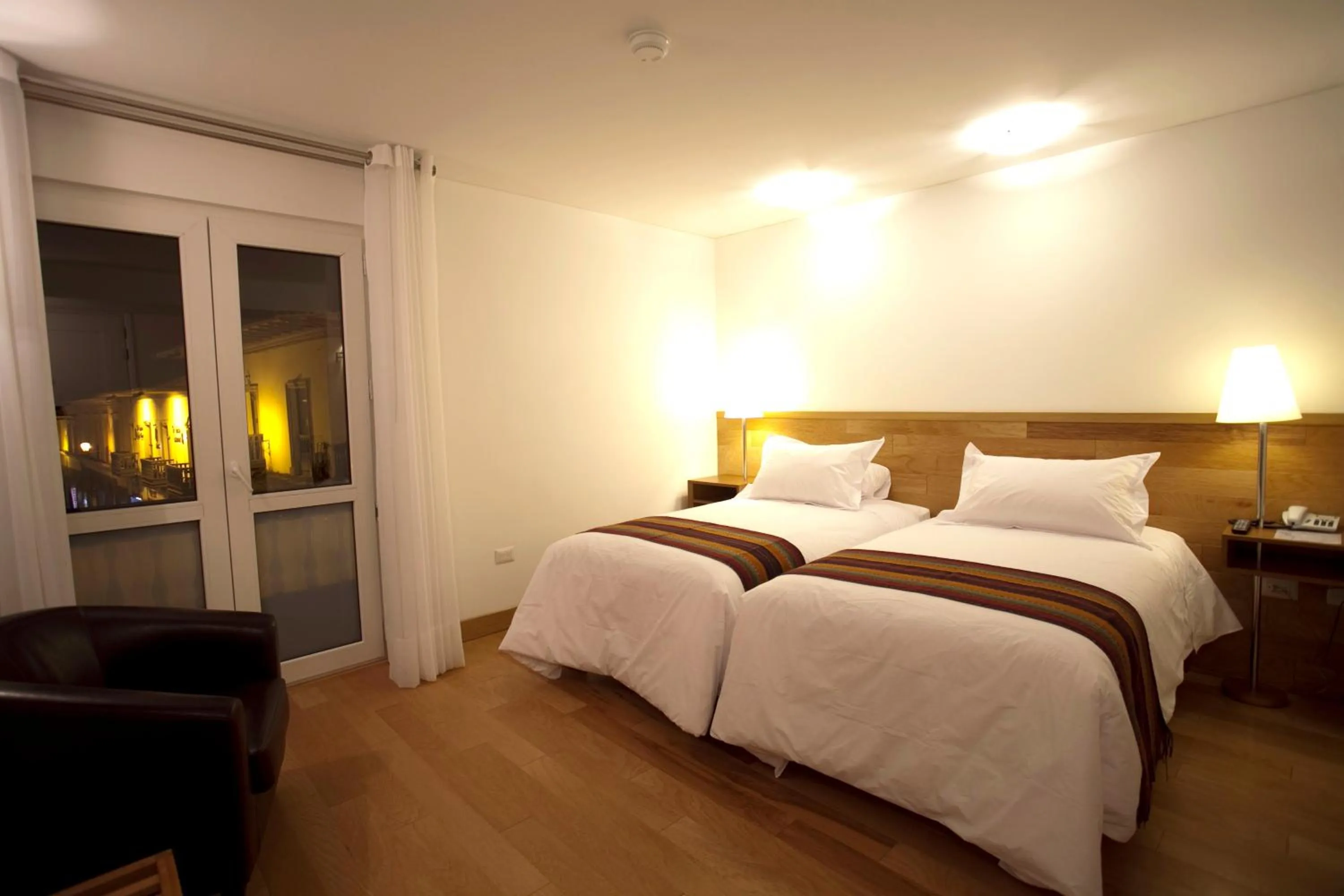 Bed in Hotel Plaza de Armas Cusco