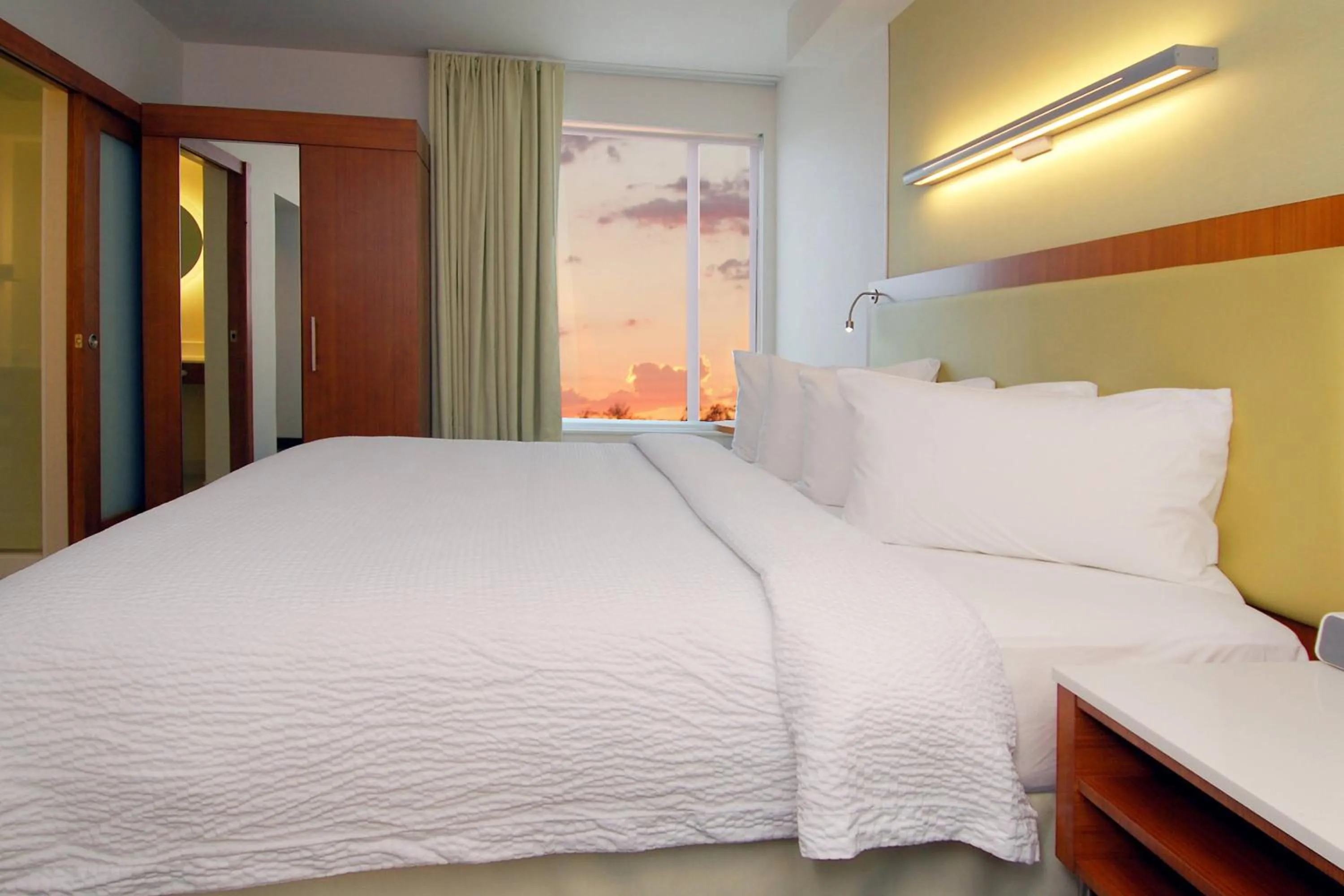 Photo of the whole room, Bed in SpringHill Suites by Marriott Las Vegas North Speedway