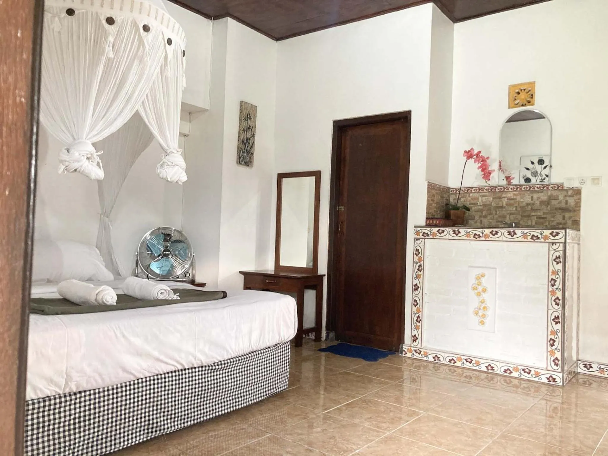 Bed in Taman Ayu Homestay Munduk Mitra RedDoorz