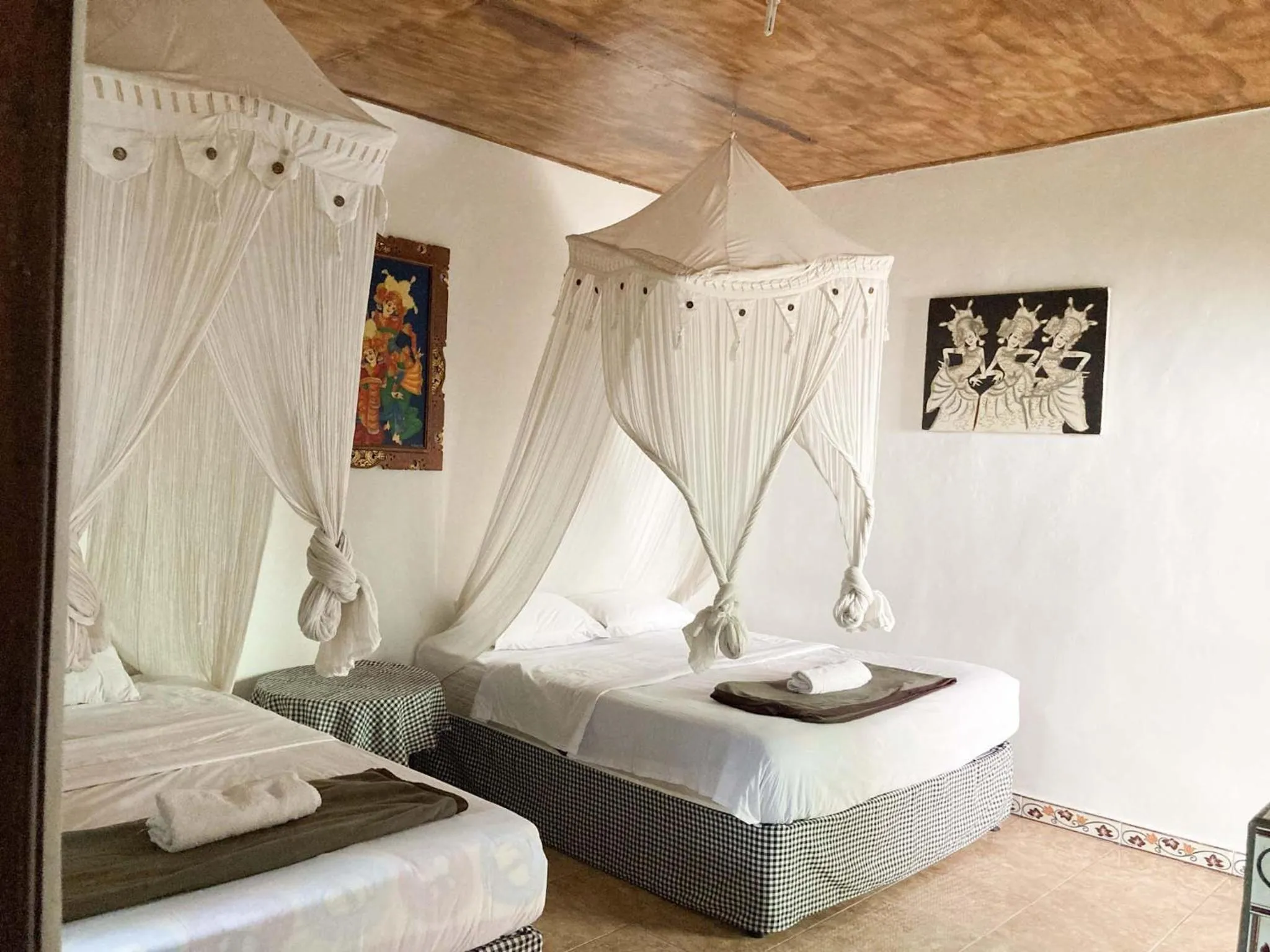 Bed in Taman Ayu Homestay Munduk Mitra RedDoorz