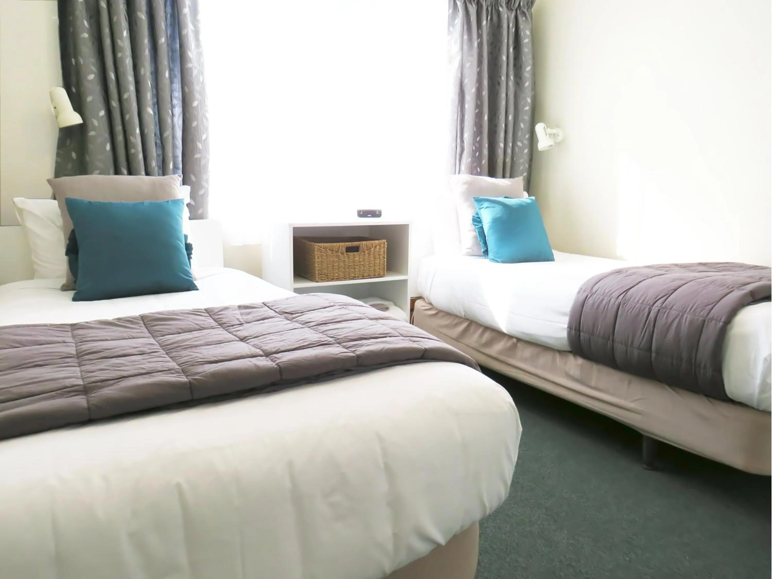 Bed in Almond Court Motel