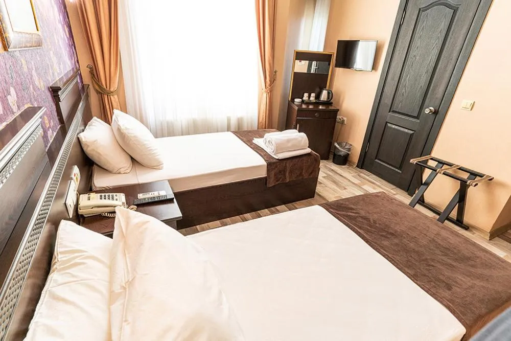 Photo of the whole room, Bed in Pamuk City Hotel