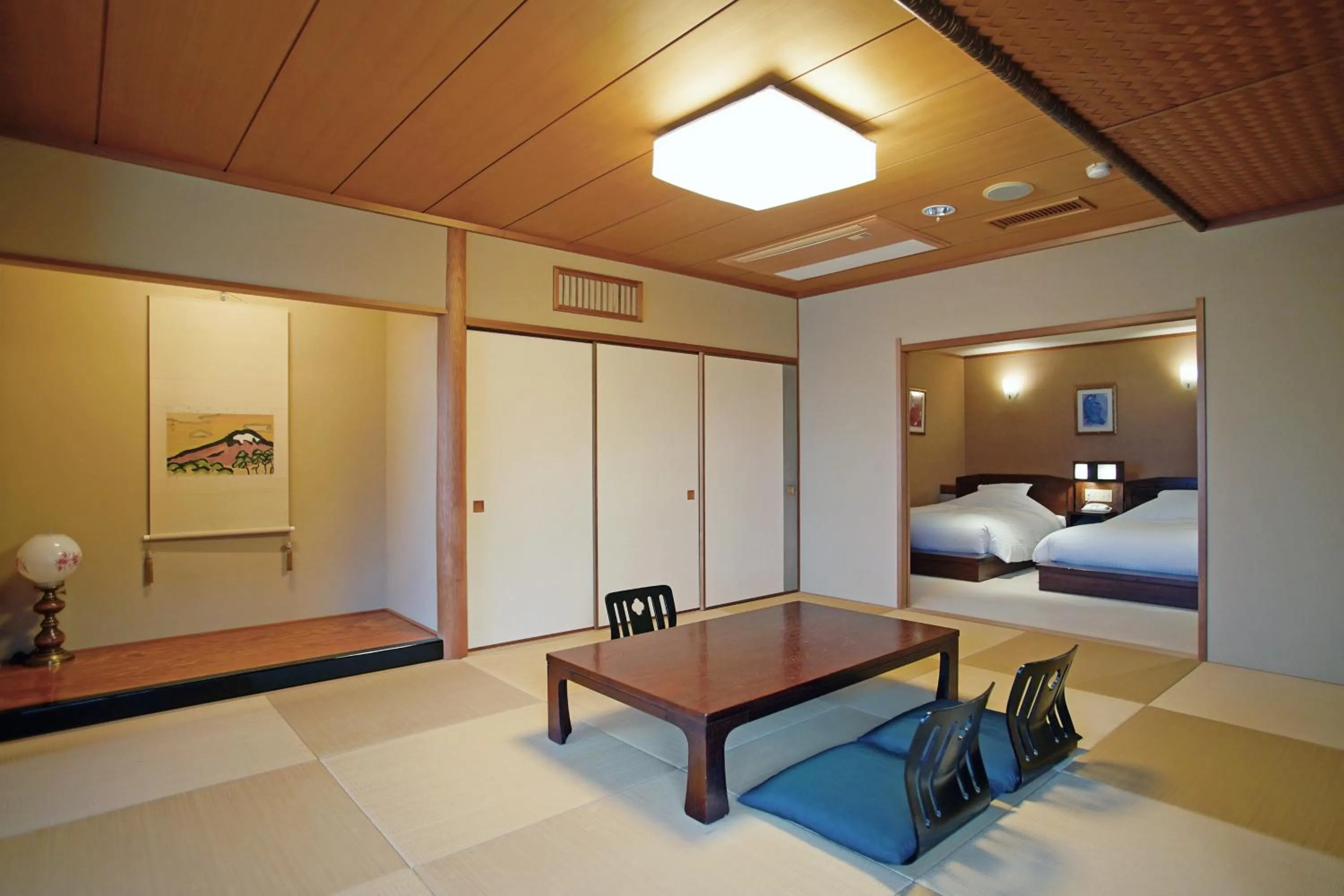 Photo of the whole room, Bed in IKI RETREAT by Onko Chishin