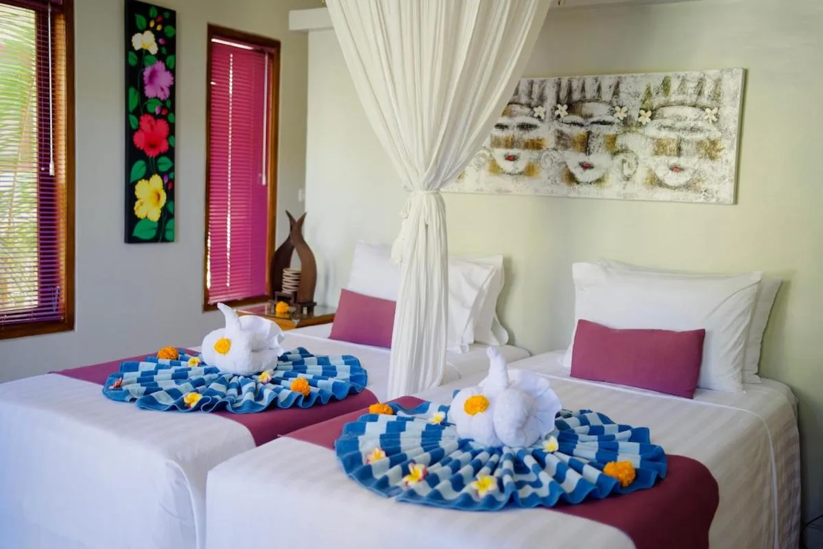 Bed in Poinciana Resort