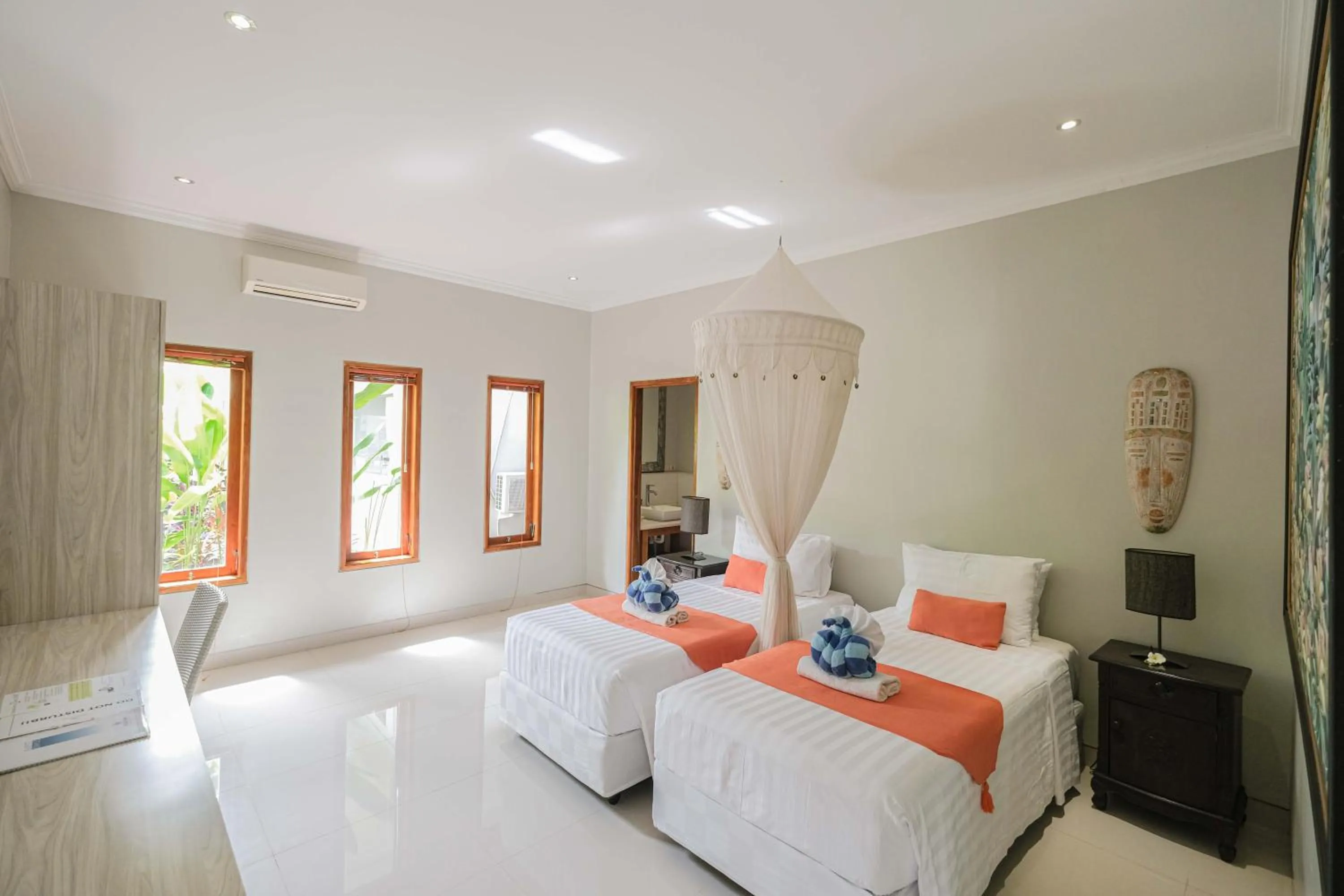 Bed in Poinciana Resort