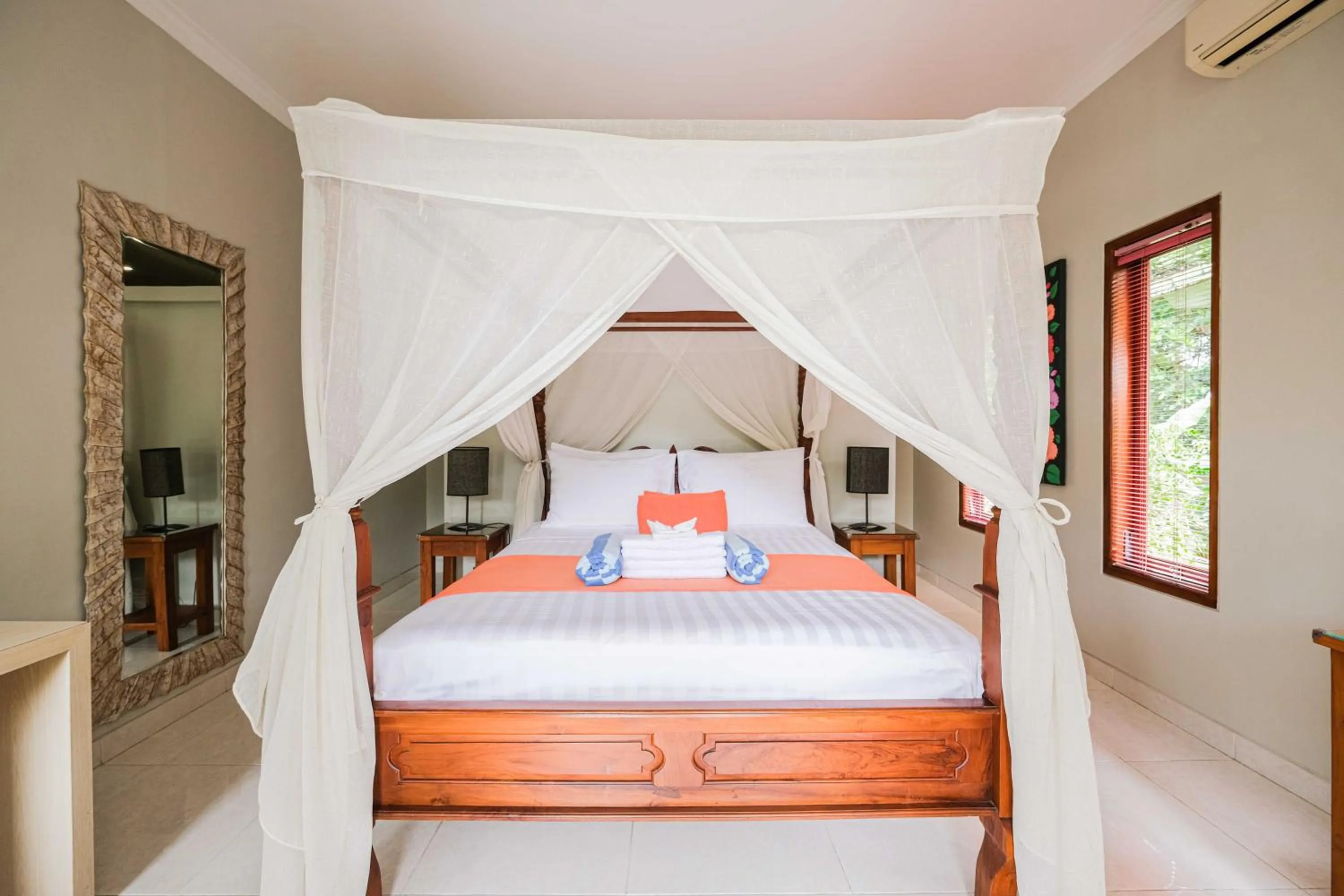 Bed in Poinciana Resort