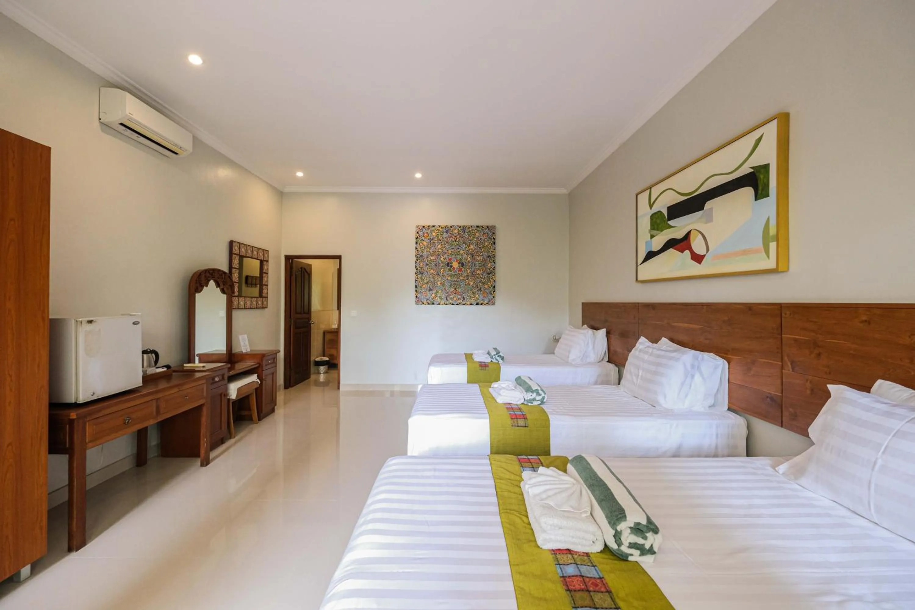 Bed in Poinciana Resort