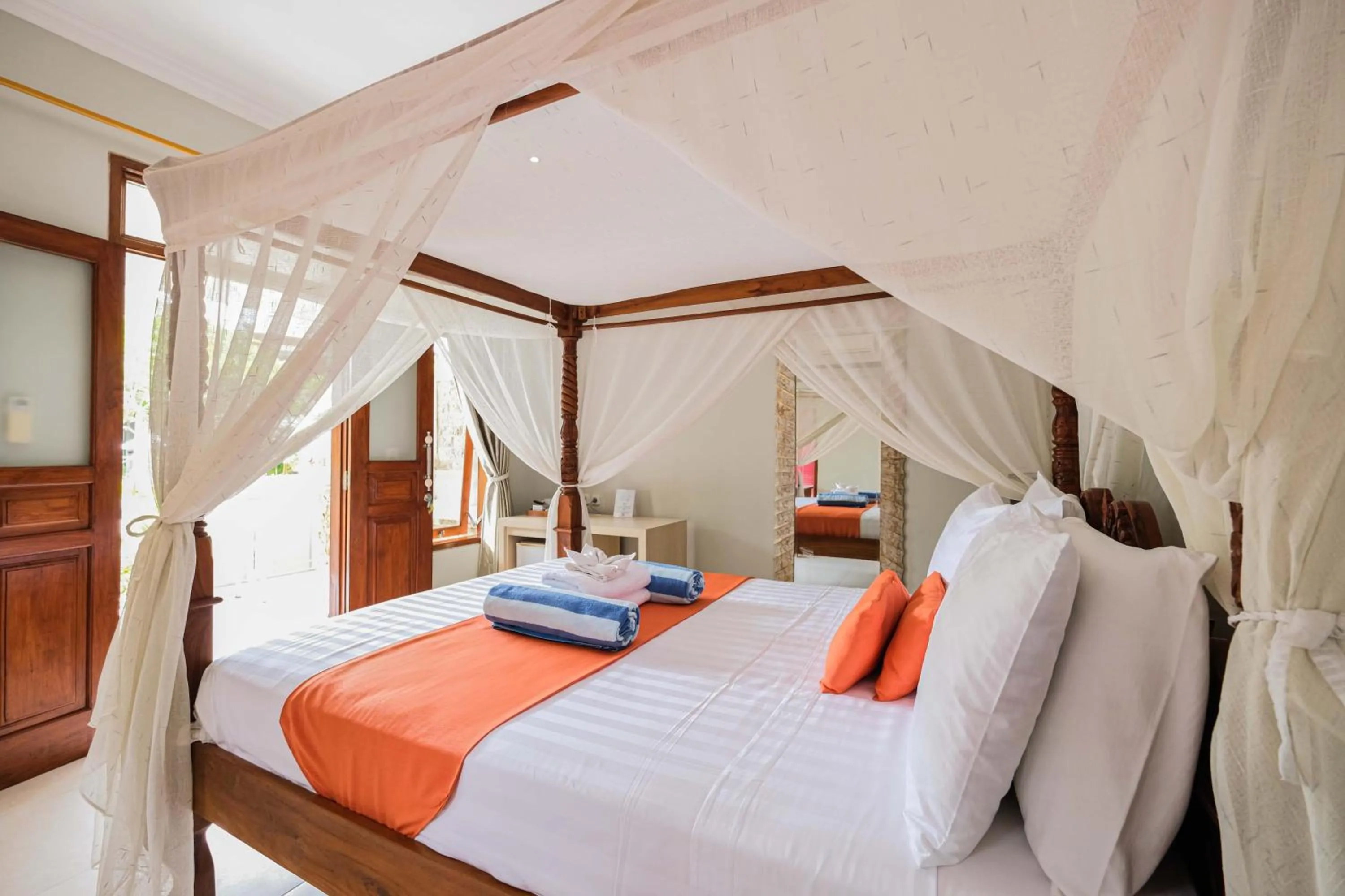 Bed in Poinciana Resort