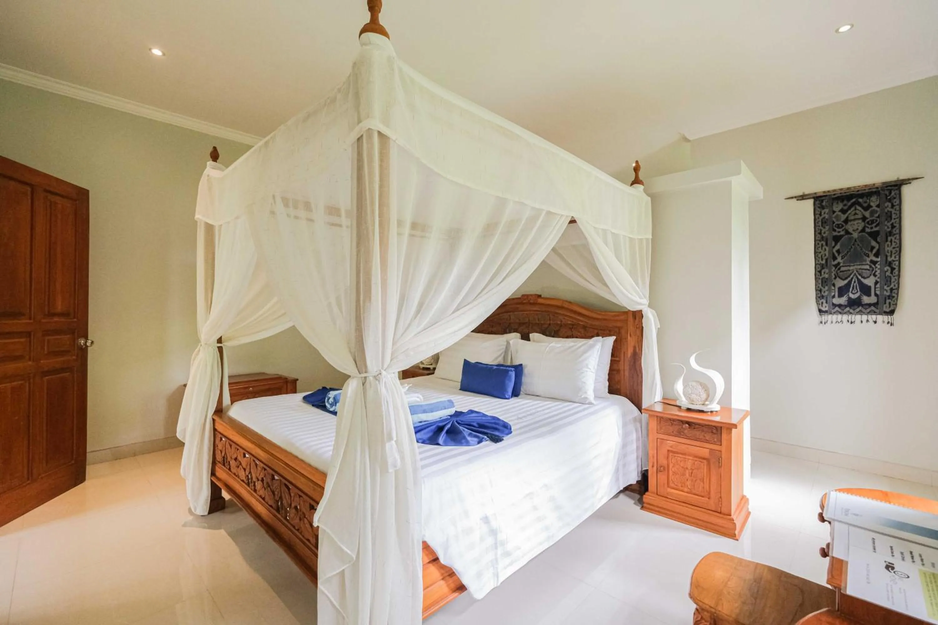 Bed in Poinciana Resort