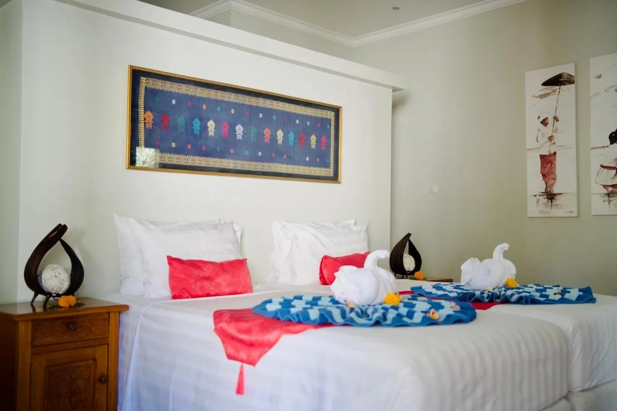 Bed in Poinciana Resort