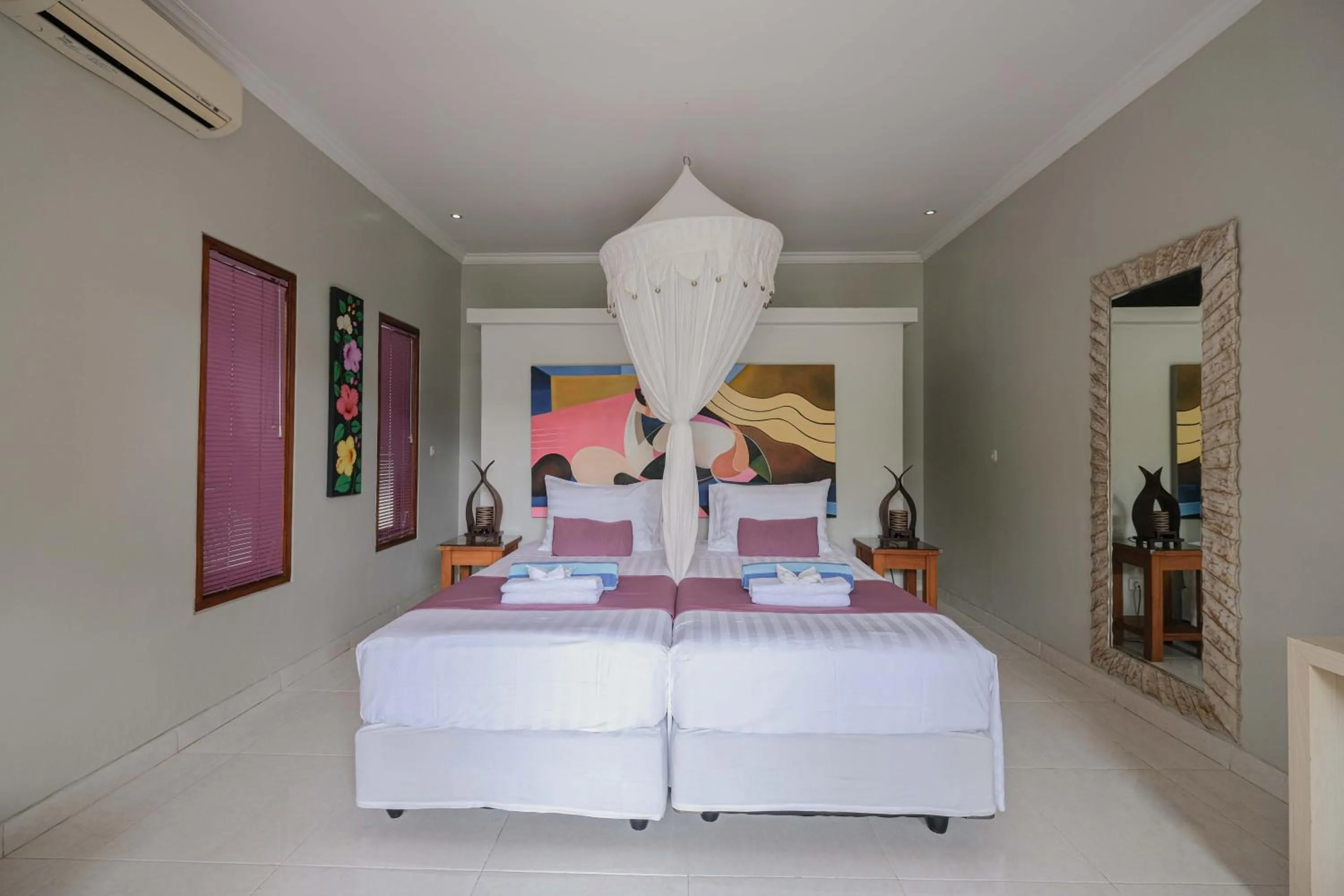 Bed in Poinciana Resort