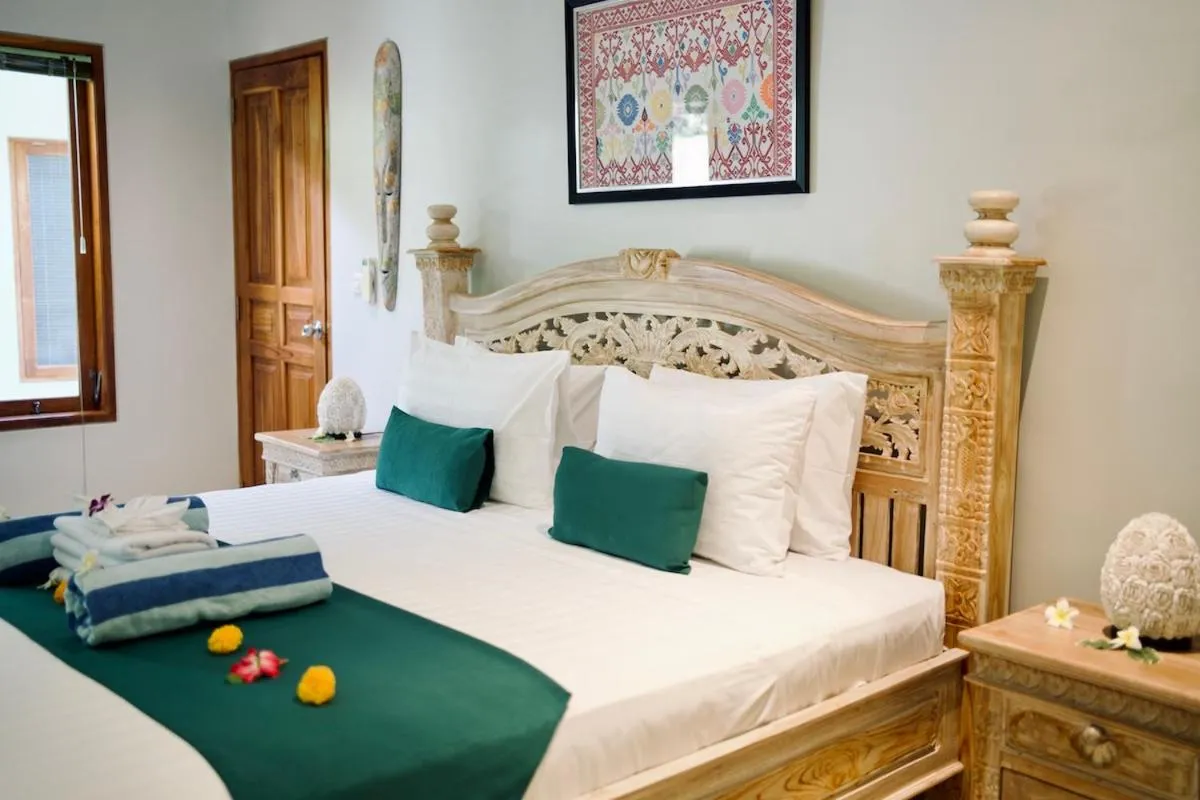 Bed in Poinciana Resort