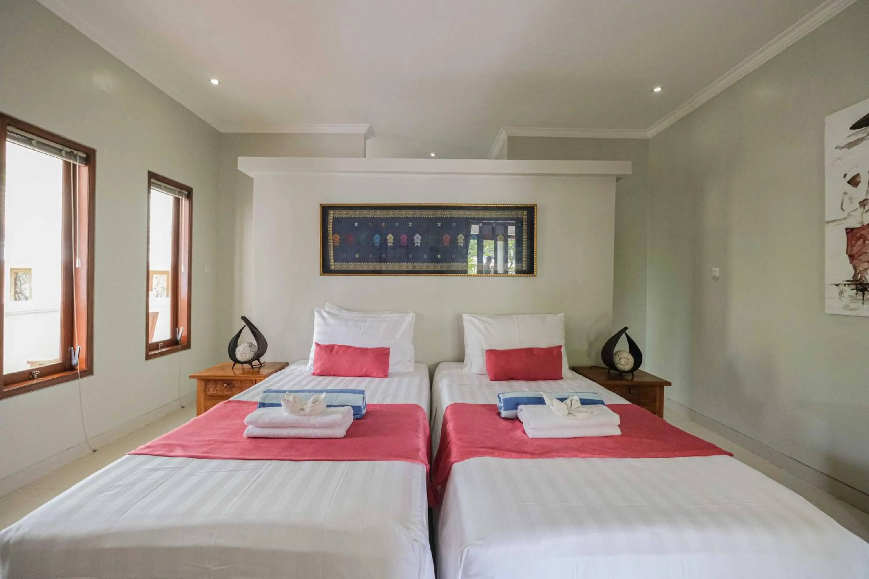 Bed in Poinciana Resort