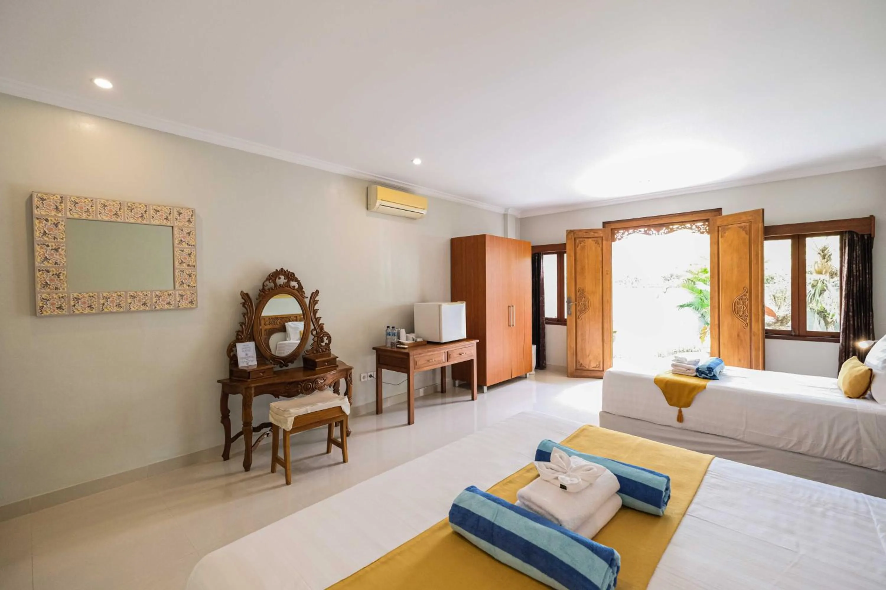 Bed in Poinciana Resort