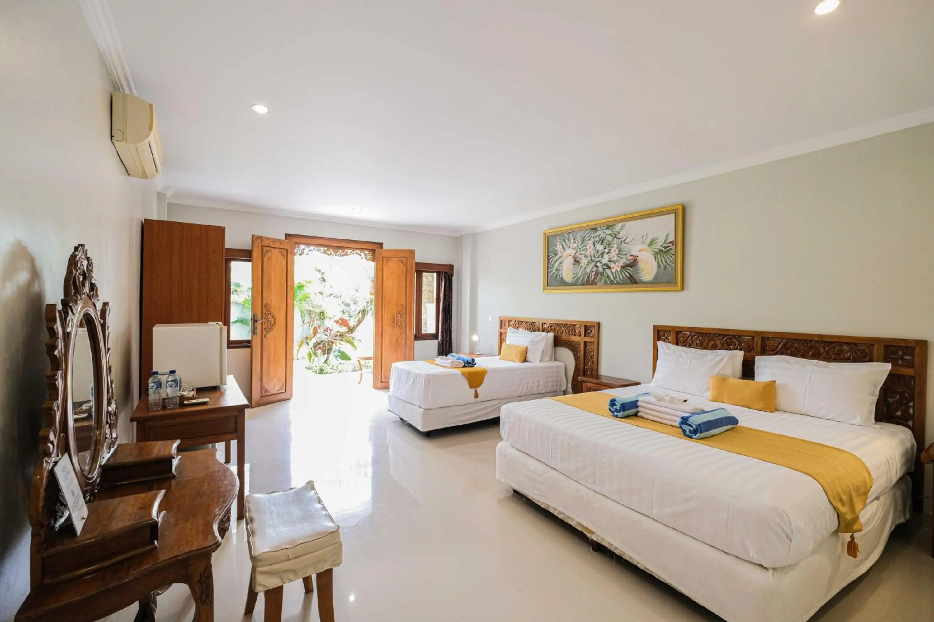 Bed in Poinciana Resort