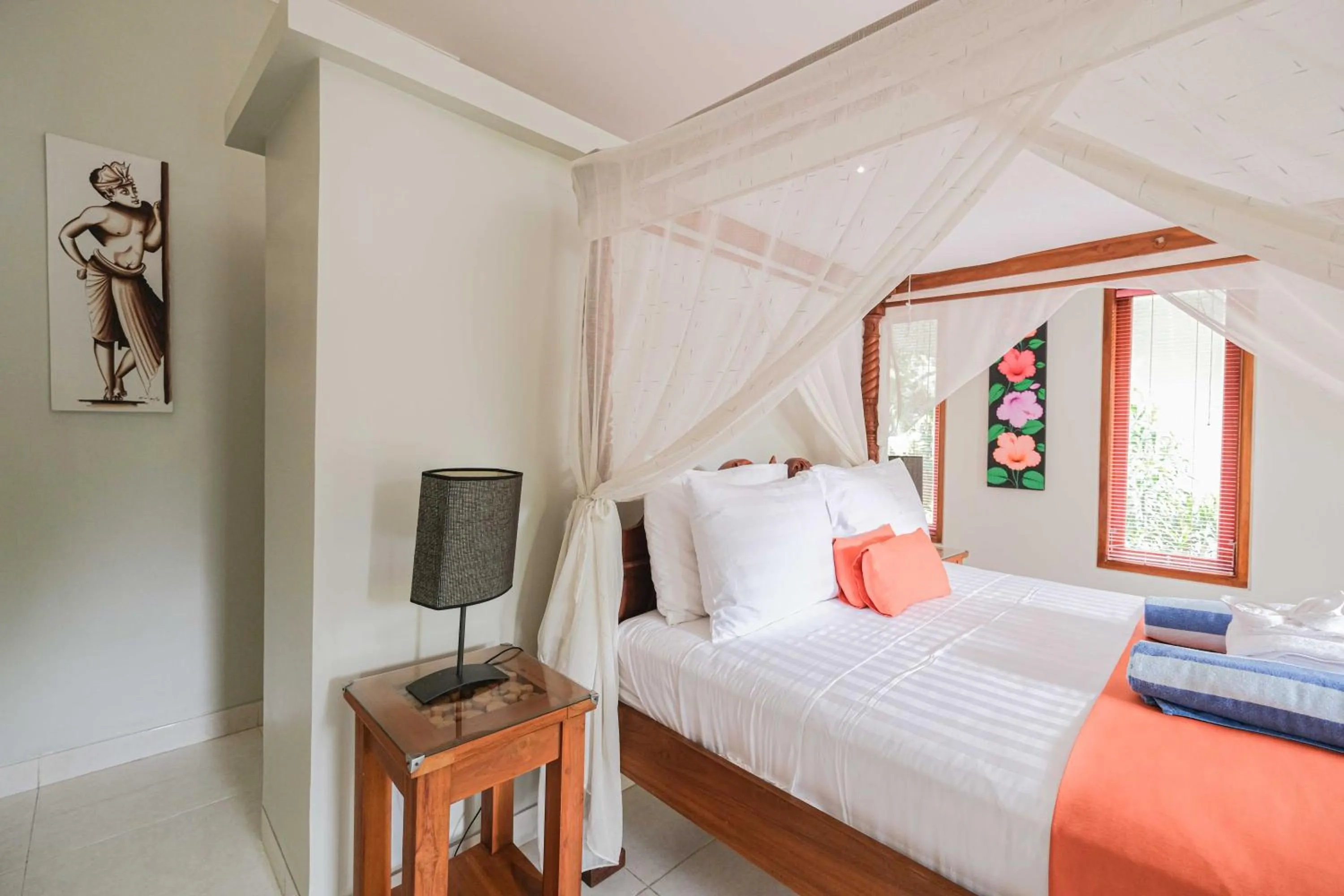 Bed in Poinciana Resort