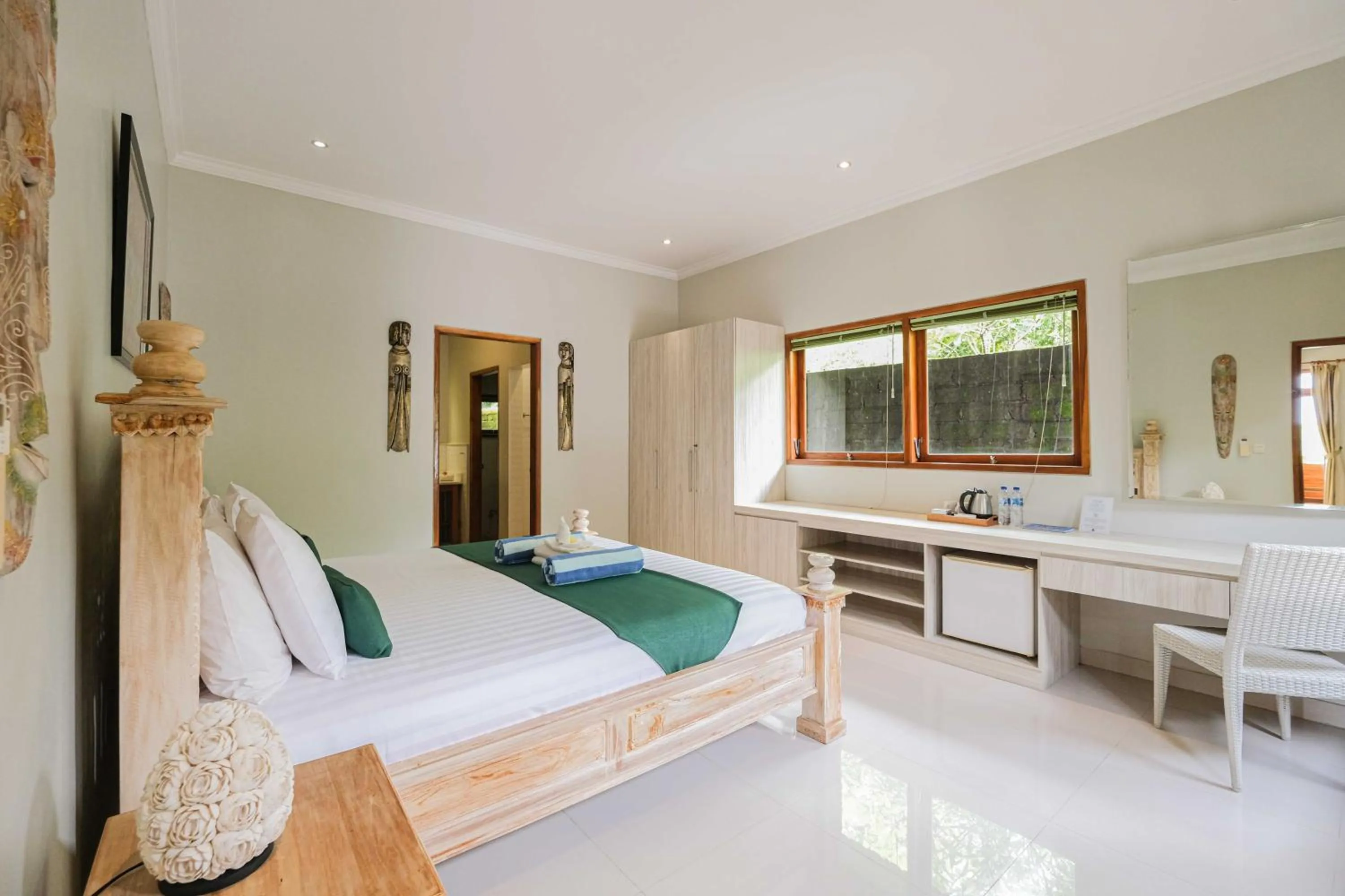 Bed in Poinciana Resort