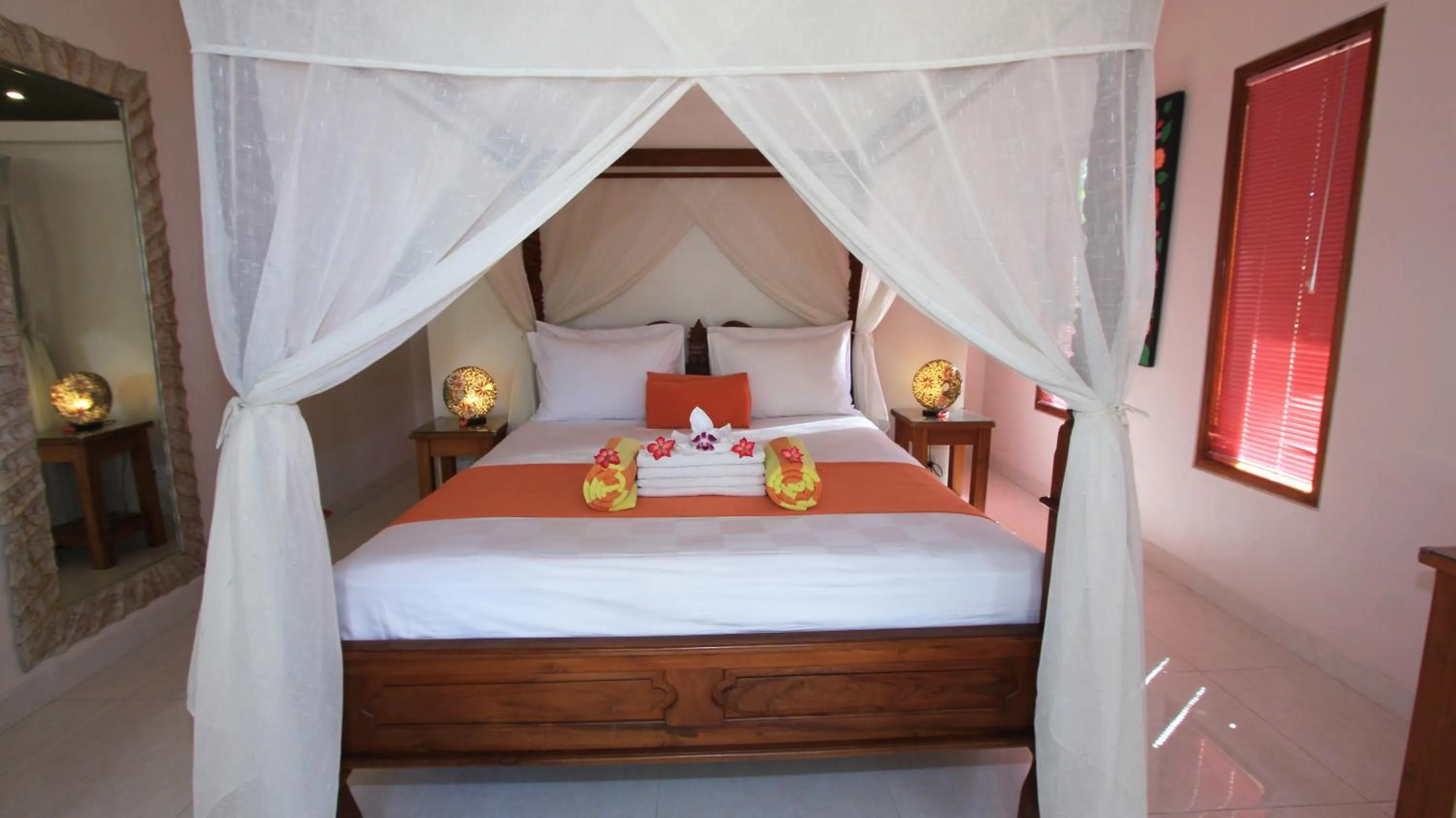 Bed in Poinciana Resort