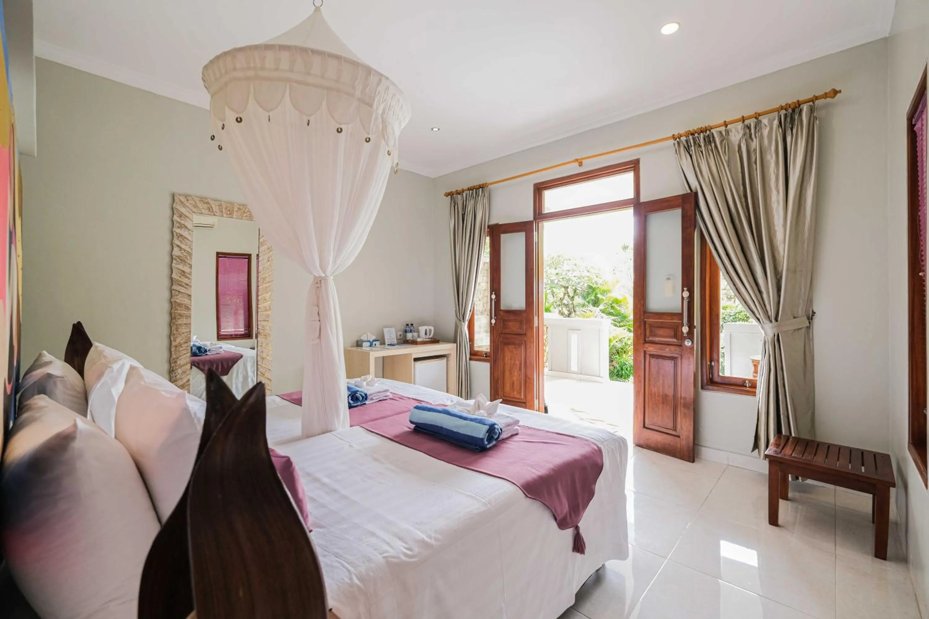 Bed in Poinciana Resort