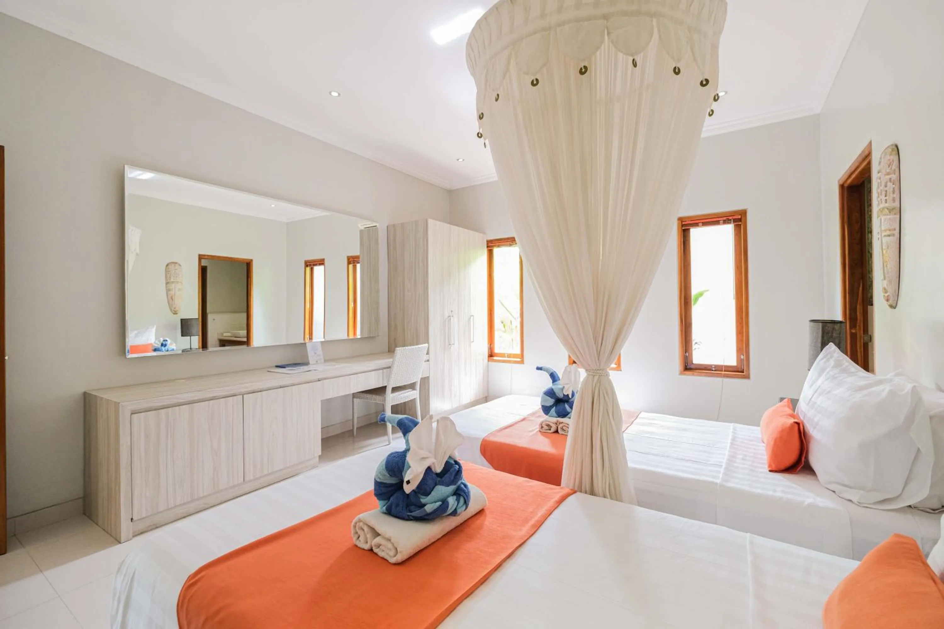 Bed in Poinciana Resort