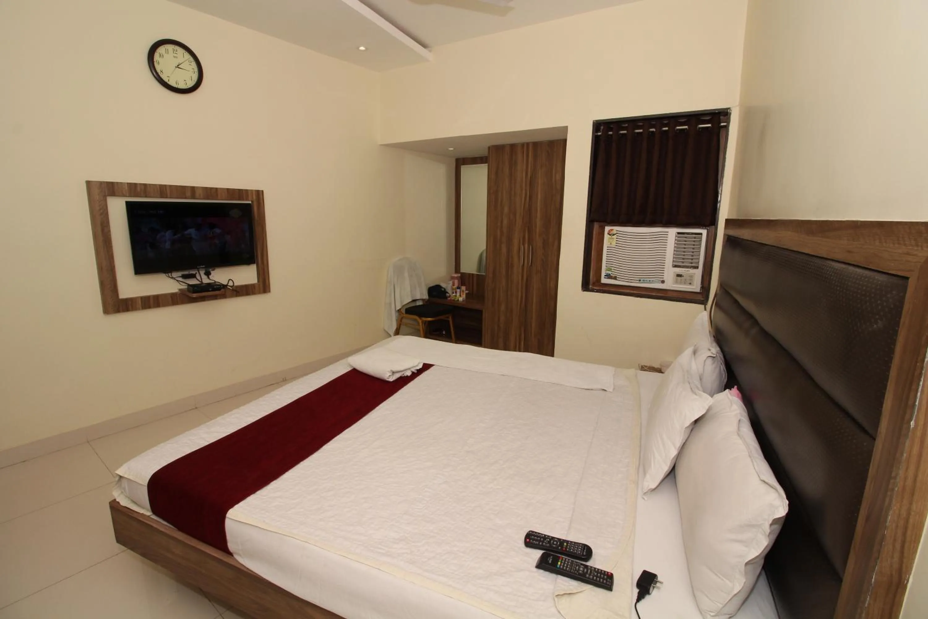 Photo of the whole room, Bed in Hotel Meera