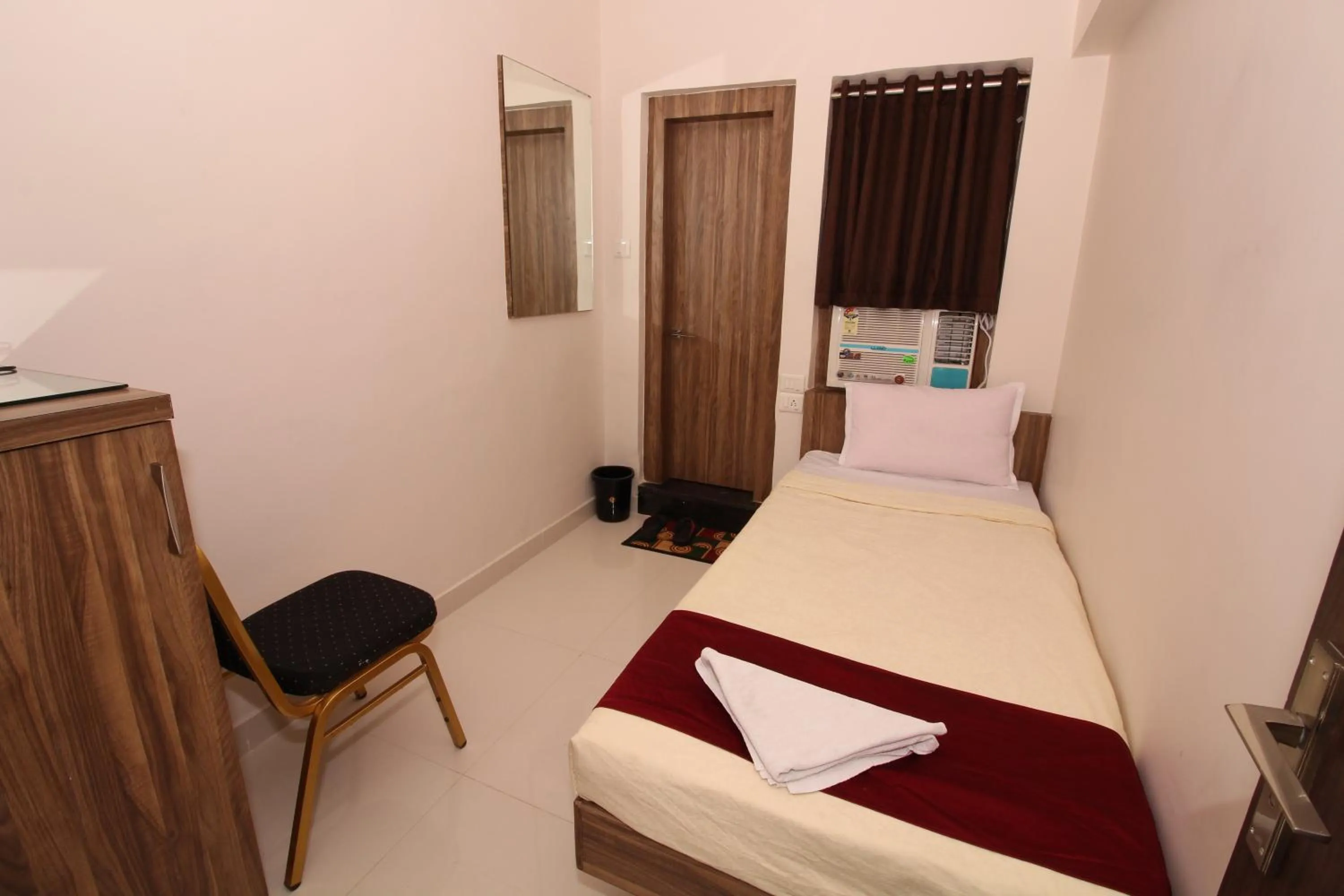 Photo of the whole room, Bed in Hotel Meera