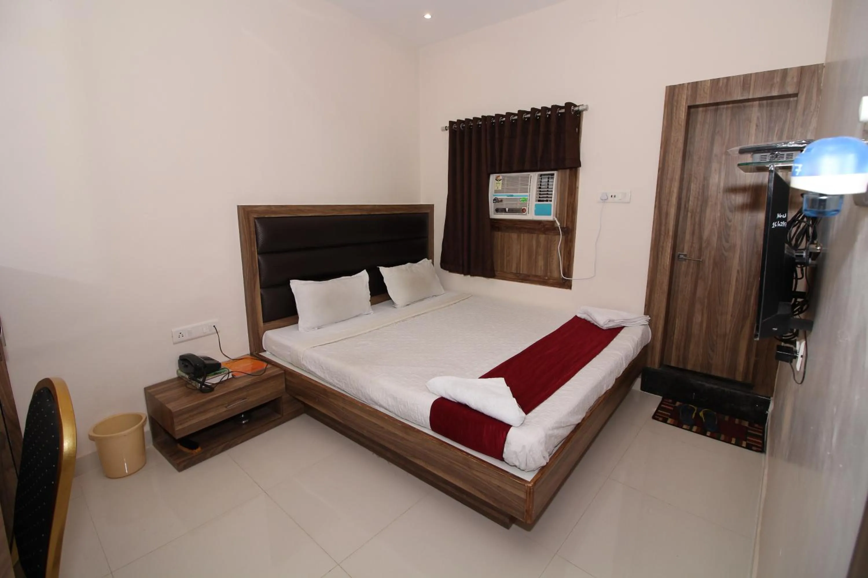 Photo of the whole room, Bed in Hotel Meera