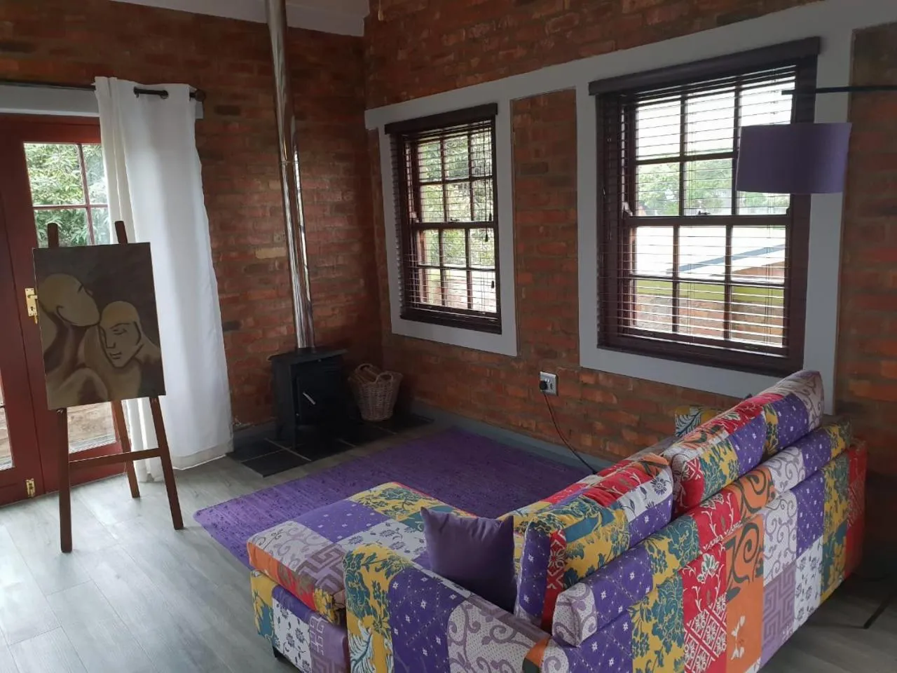 Seating area, Bed in Port Del Mar Guesthouse
