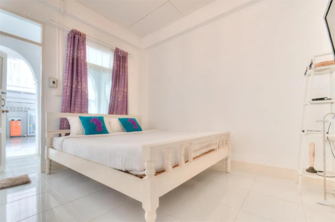 Bed in Khao Tao Beach Lodge Old Siam